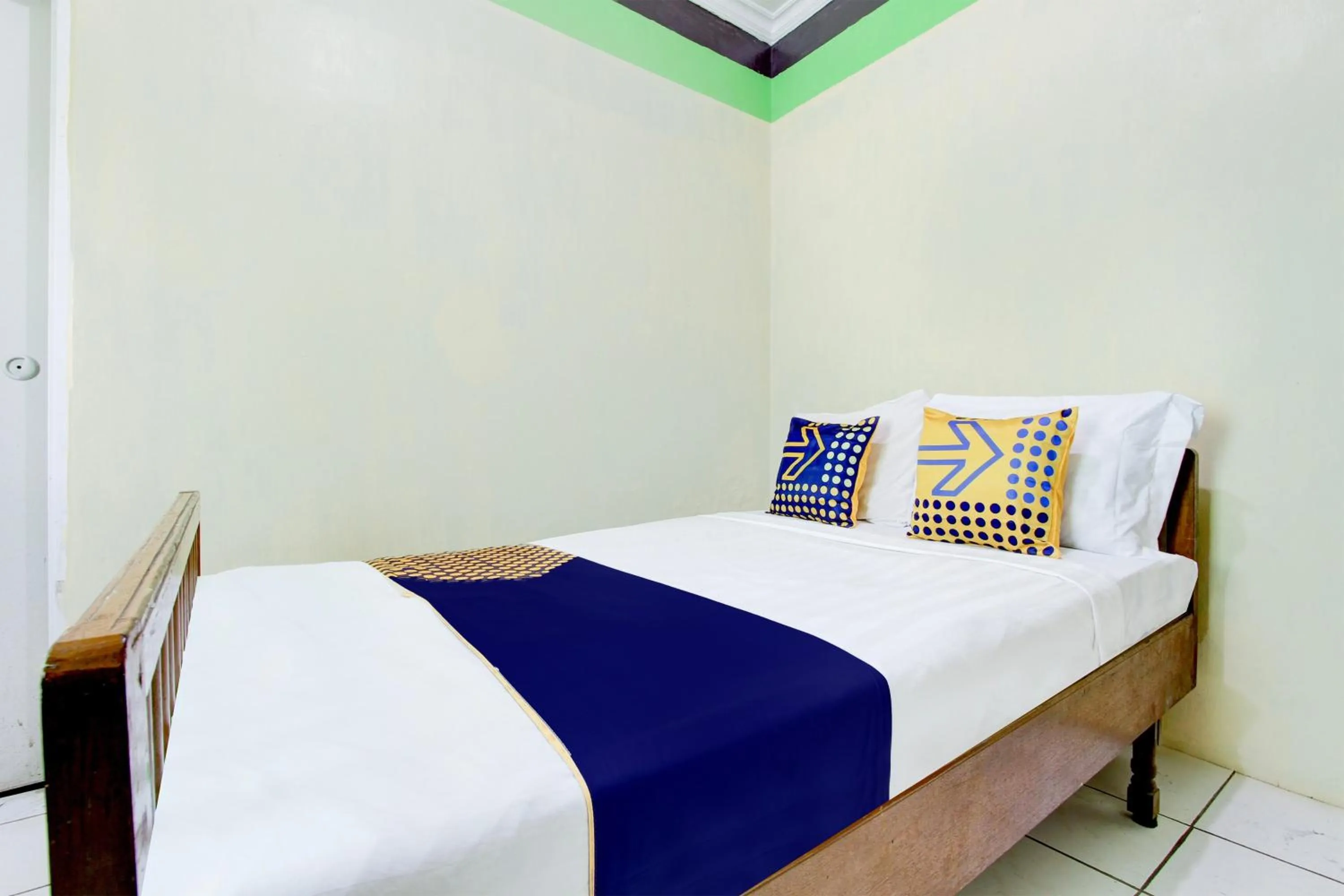 Bedroom in Hotel O Homestay Bintang Syariah