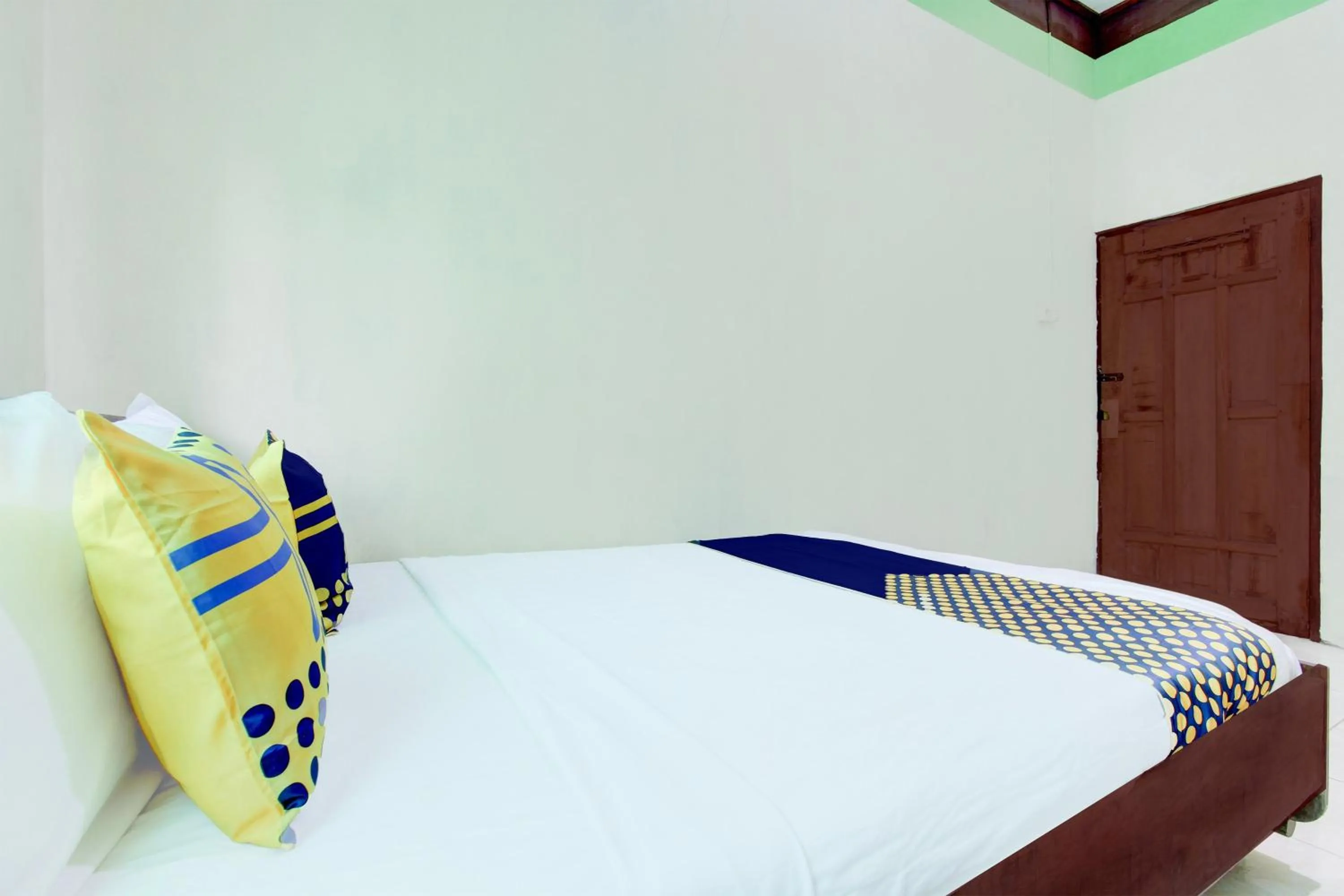 Bedroom in Hotel O Homestay Bintang Syariah