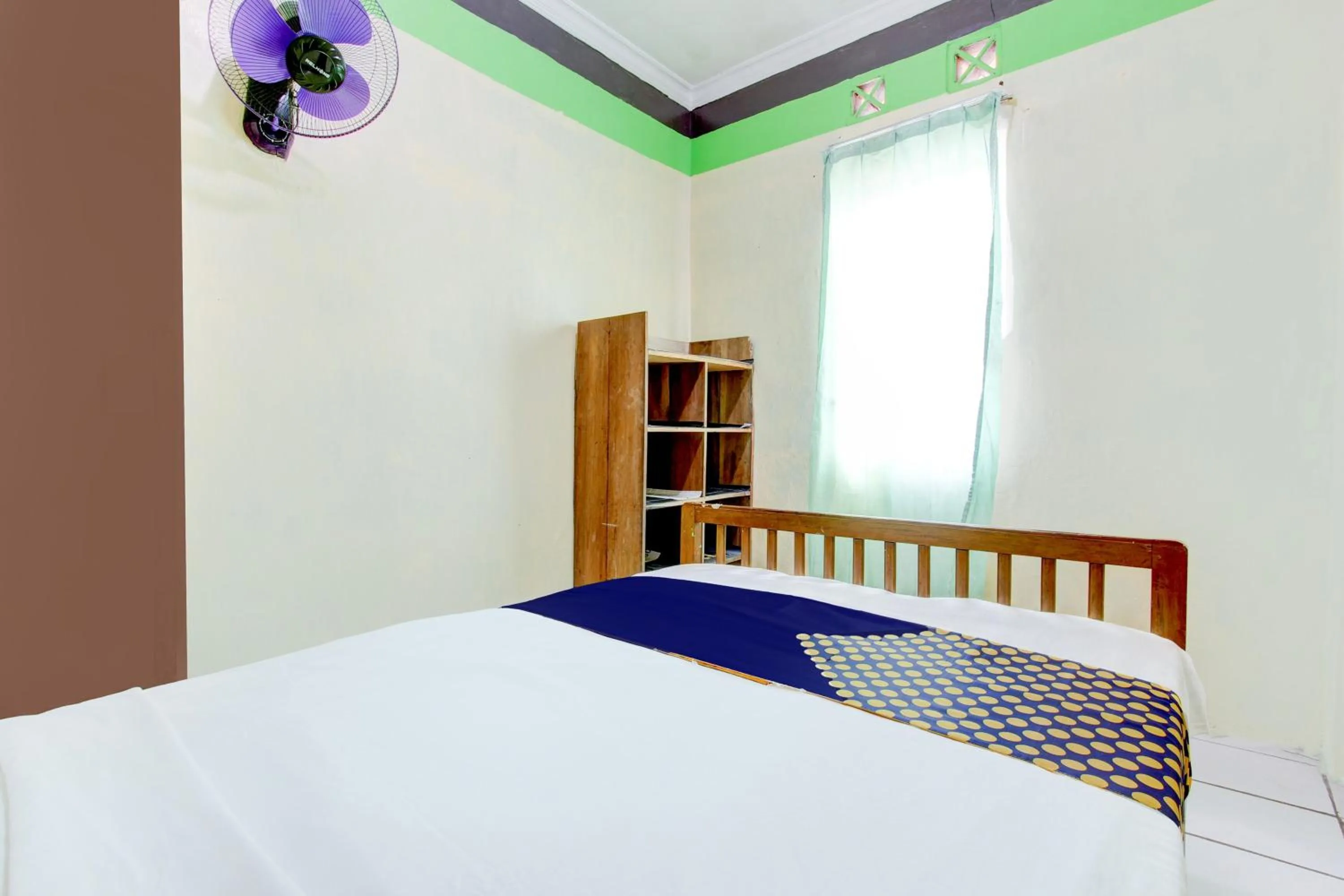 Bedroom in Hotel O Homestay Bintang Syariah