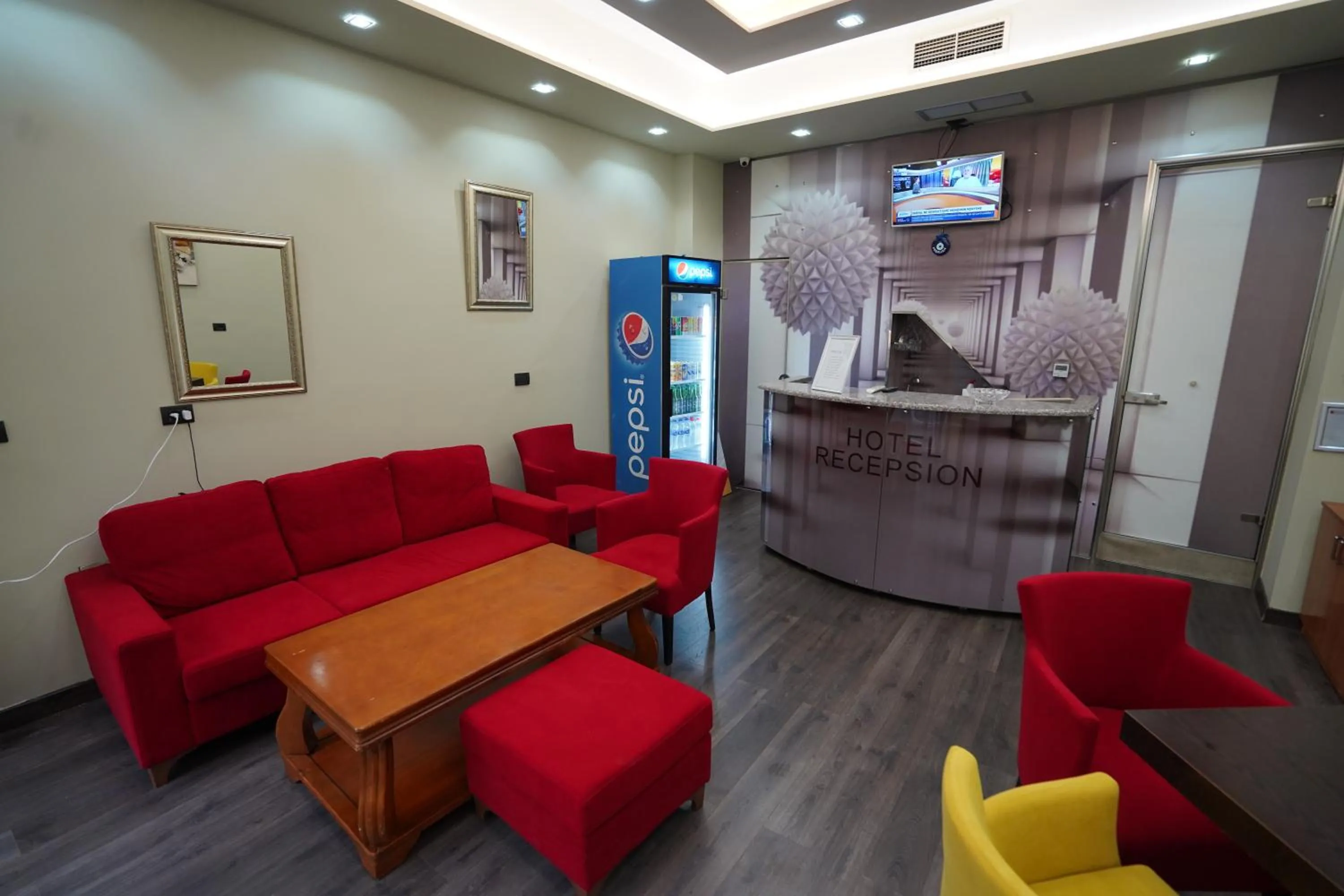 Communal lounge/ TV room in Driti Central Hotel