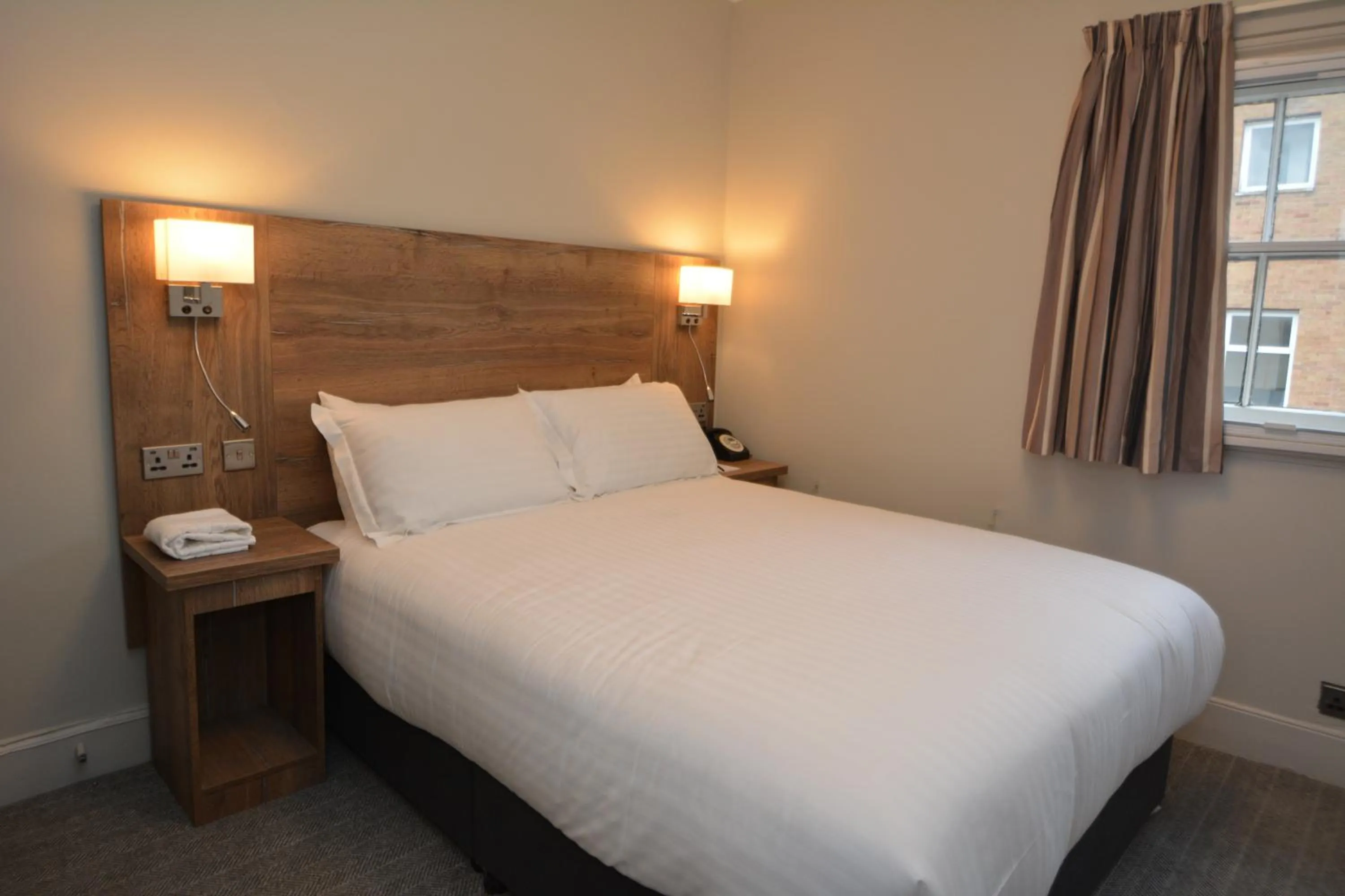 Bed in The Rugby Hotel