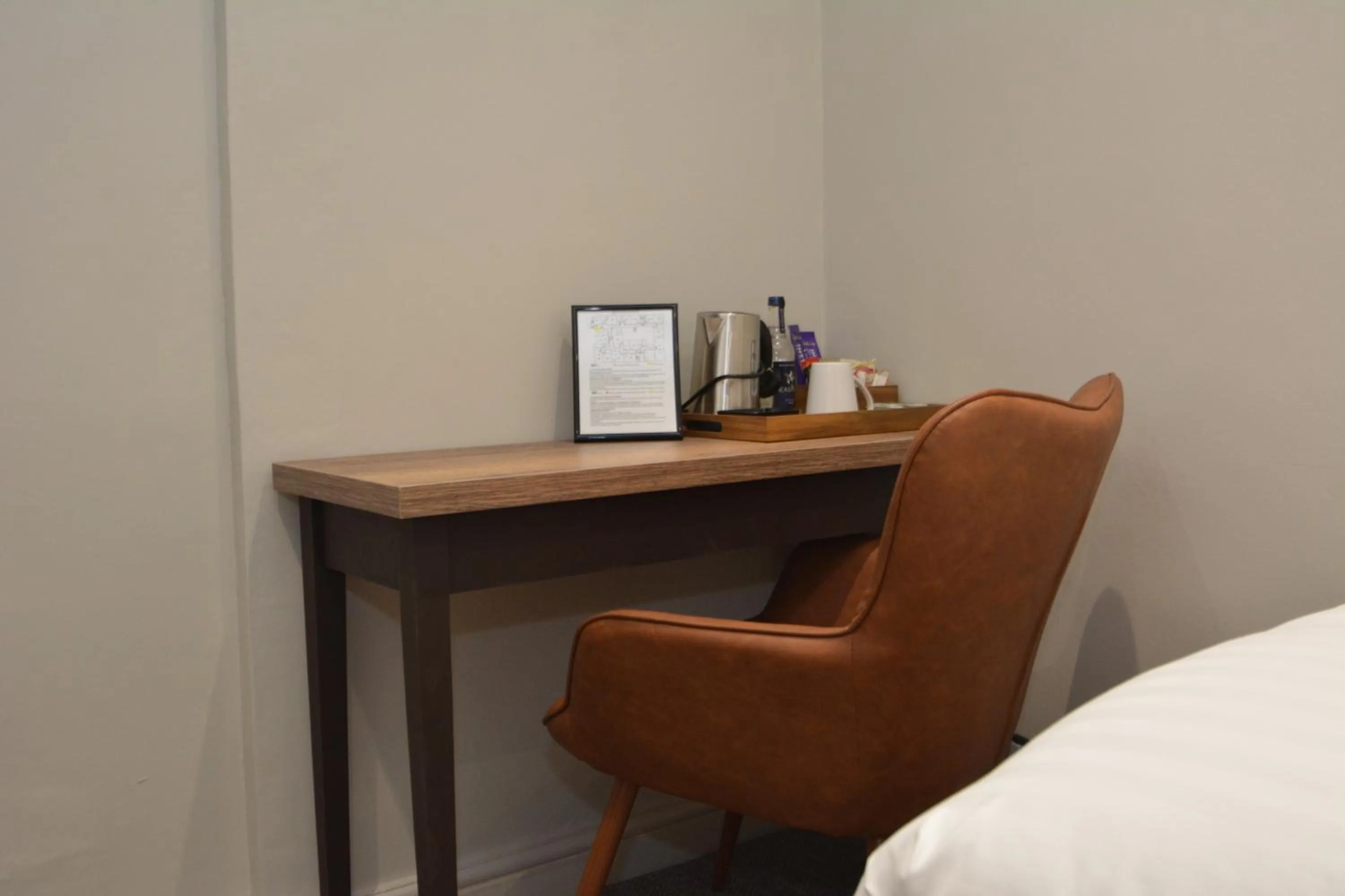 Bed in The Rugby Hotel