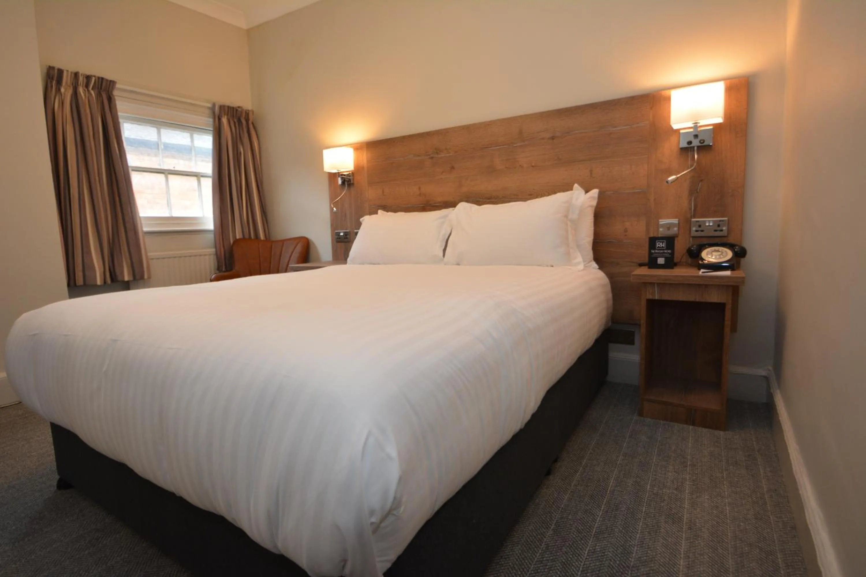 Bed in The Rugby Hotel