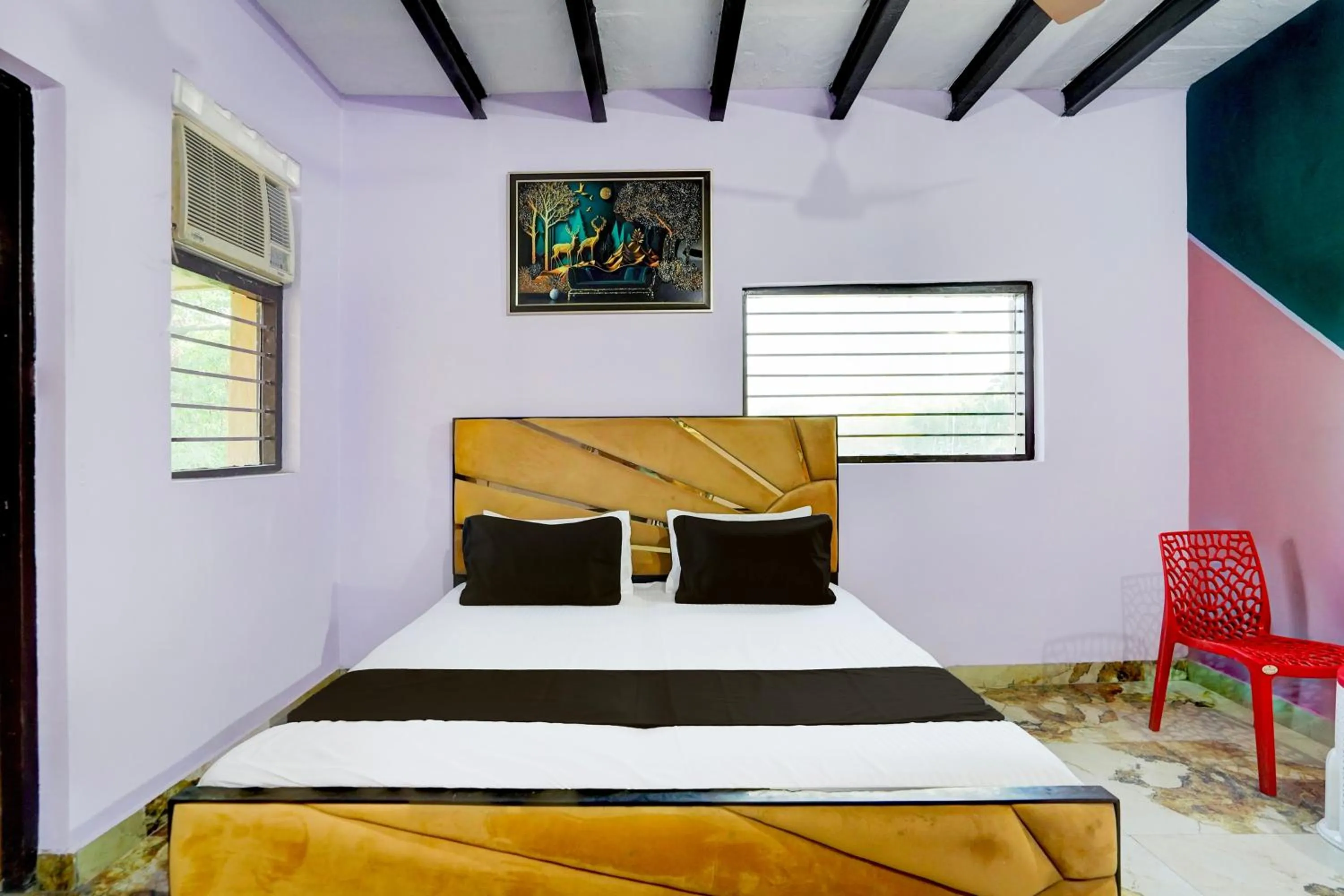 Bedroom in Hotel O YAMUNA RESORT