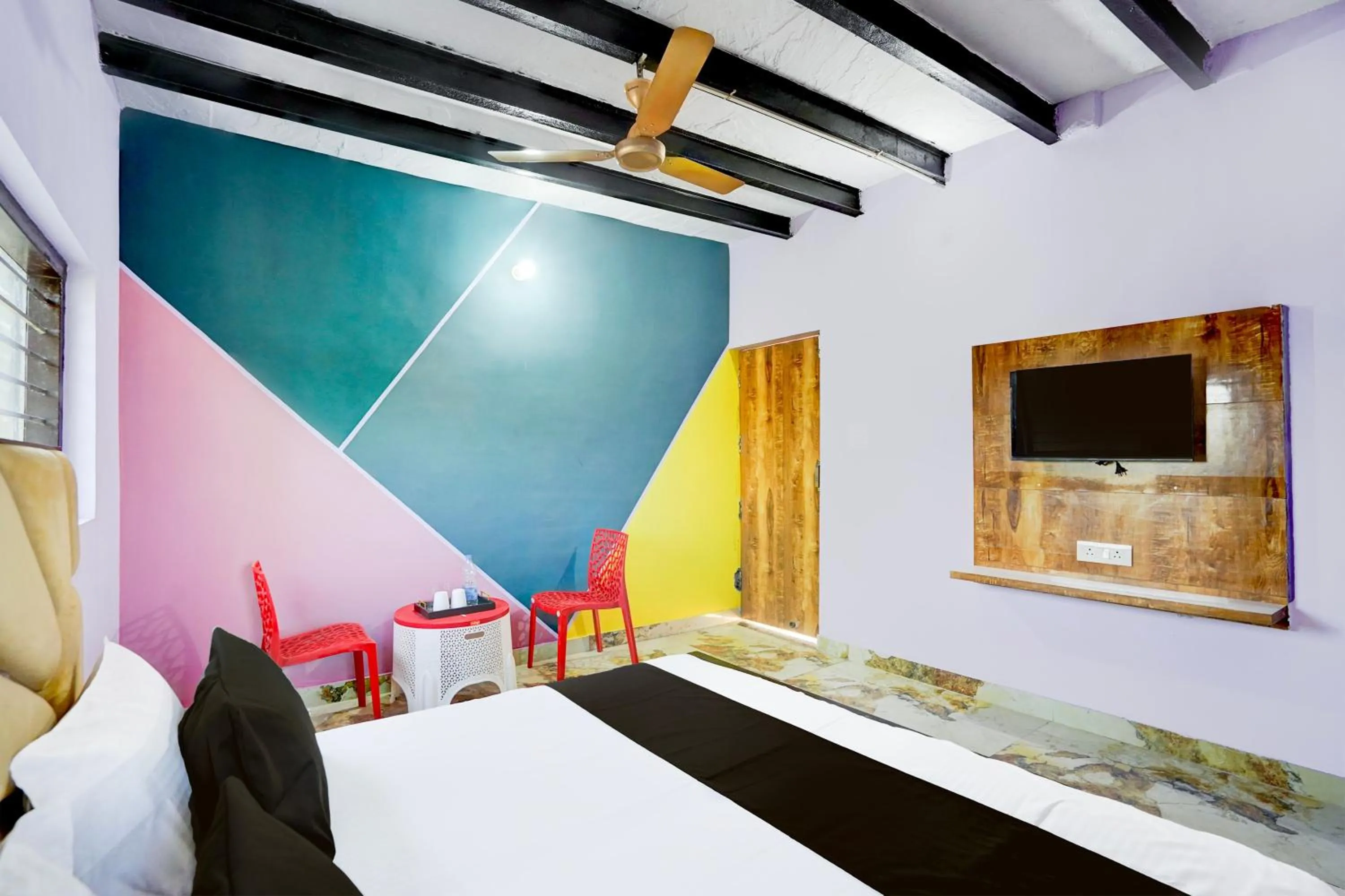 Bedroom in Hotel O YAMUNA RESORT