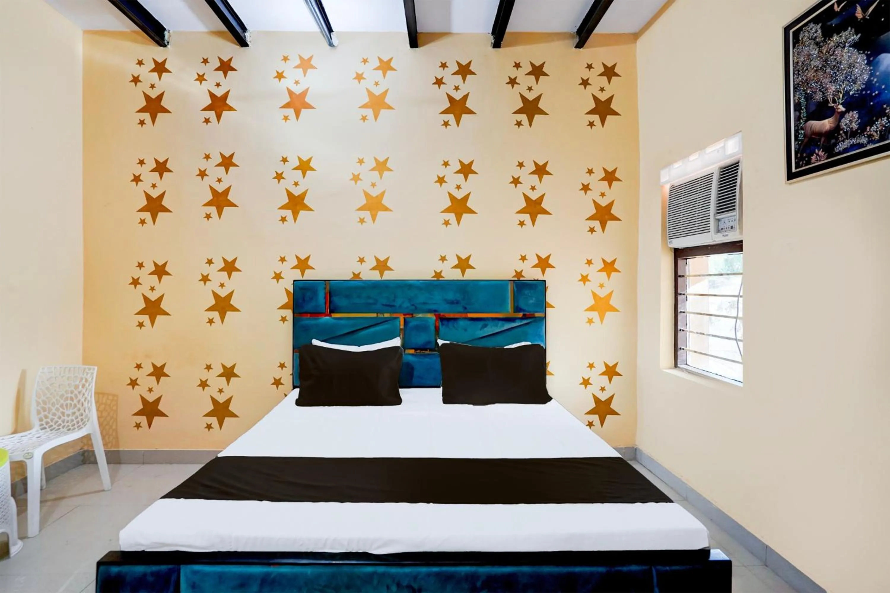 Bedroom in Hotel O YAMUNA RESORT