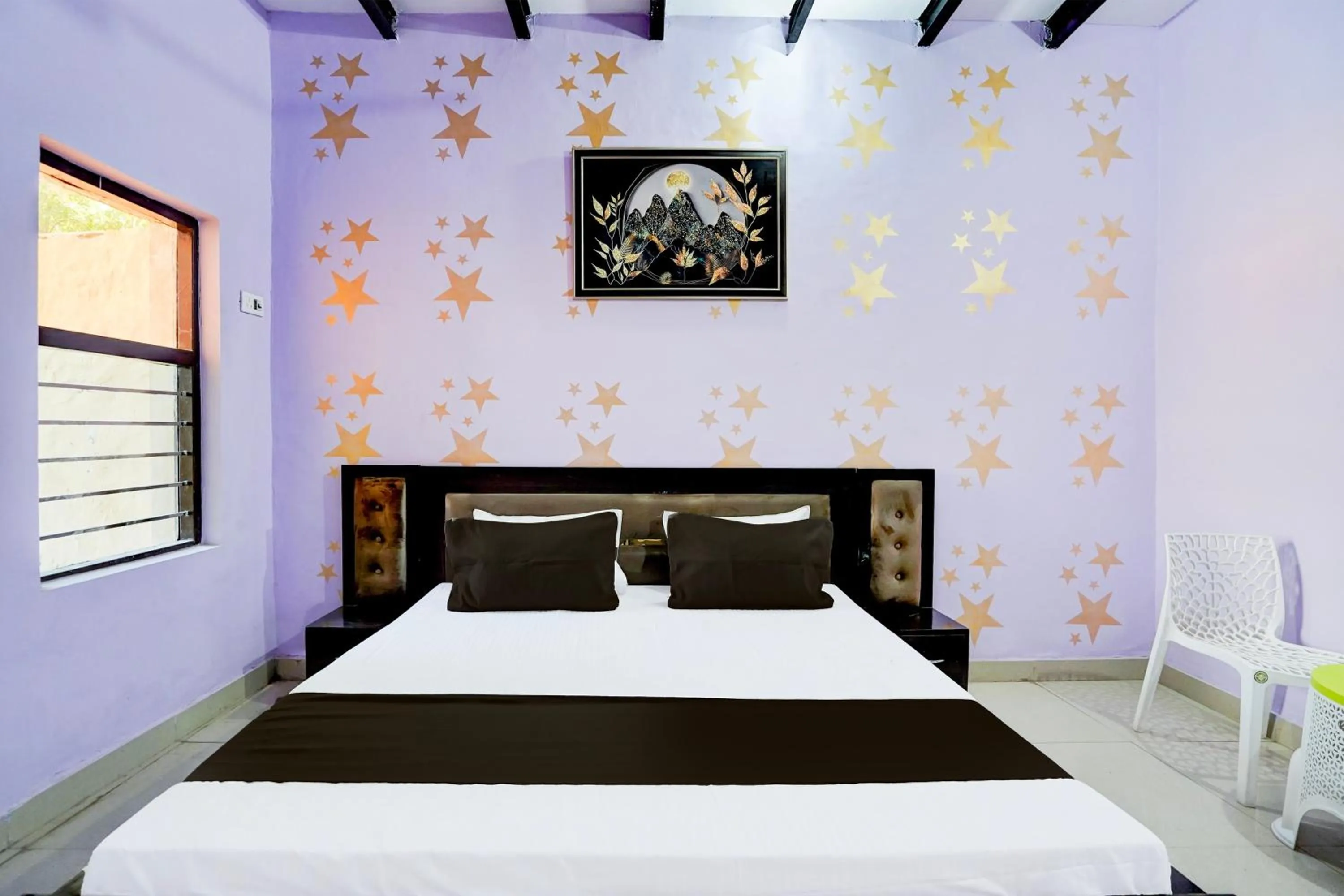 Bedroom in Hotel O YAMUNA RESORT