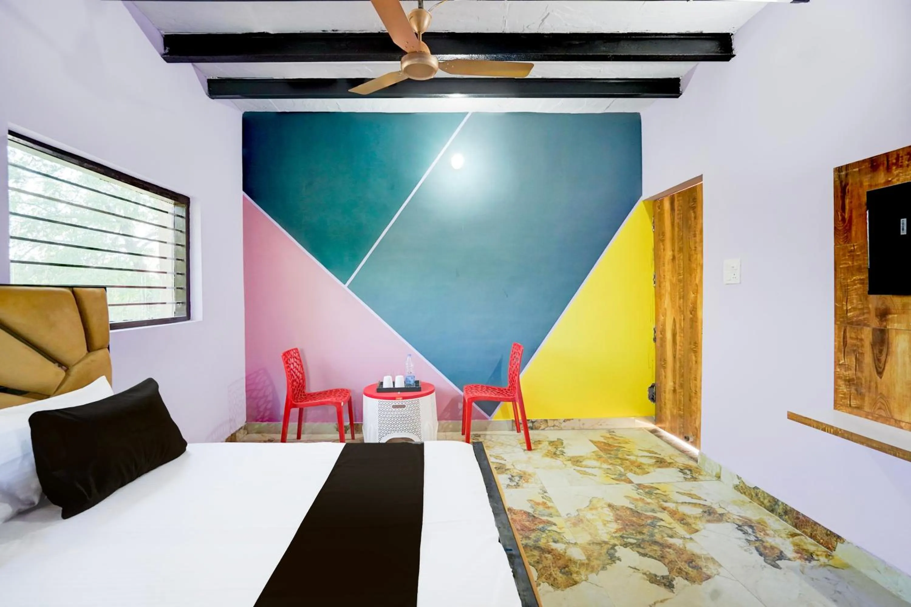 Bedroom in Hotel O YAMUNA RESORT