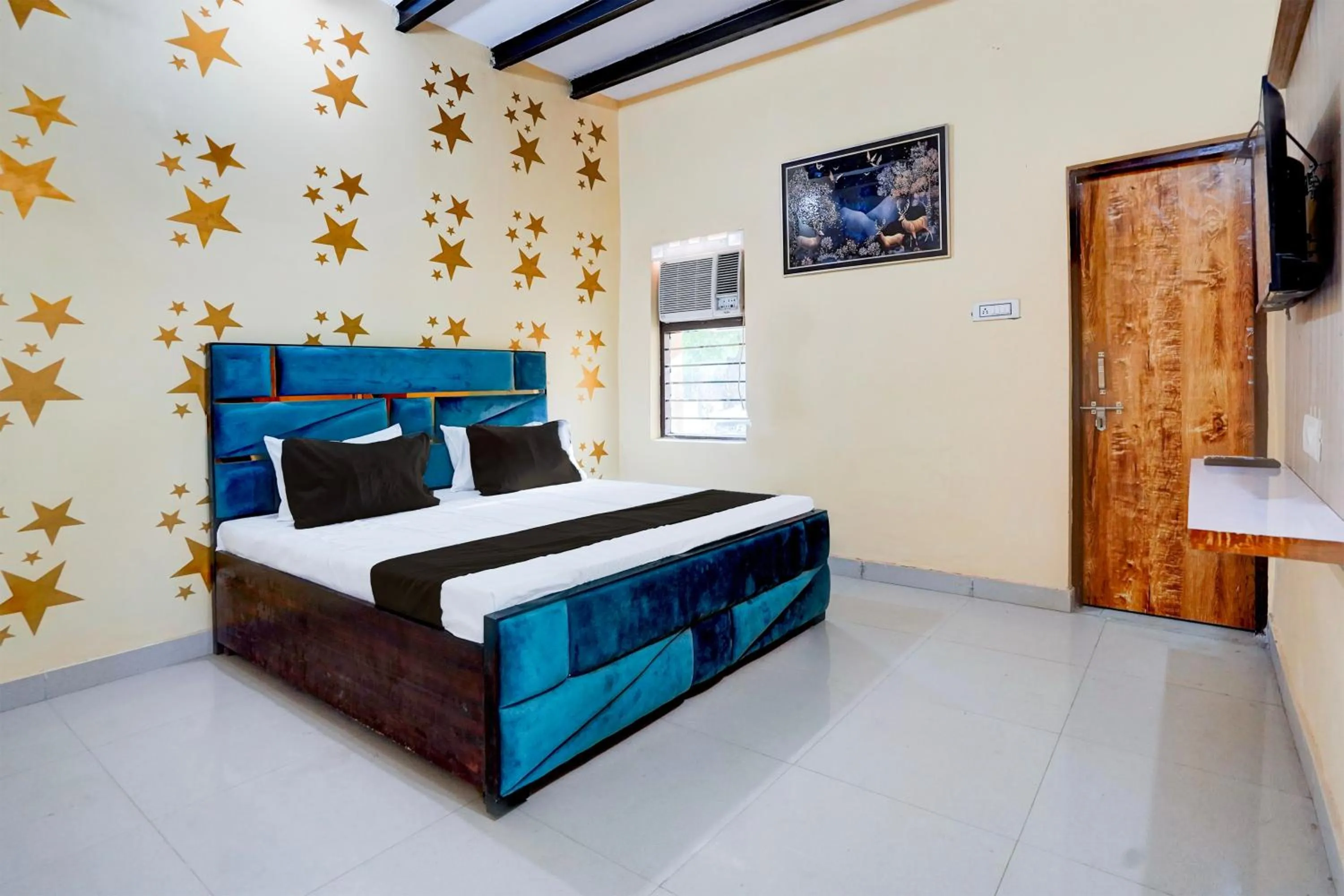 Bedroom in Hotel O YAMUNA RESORT