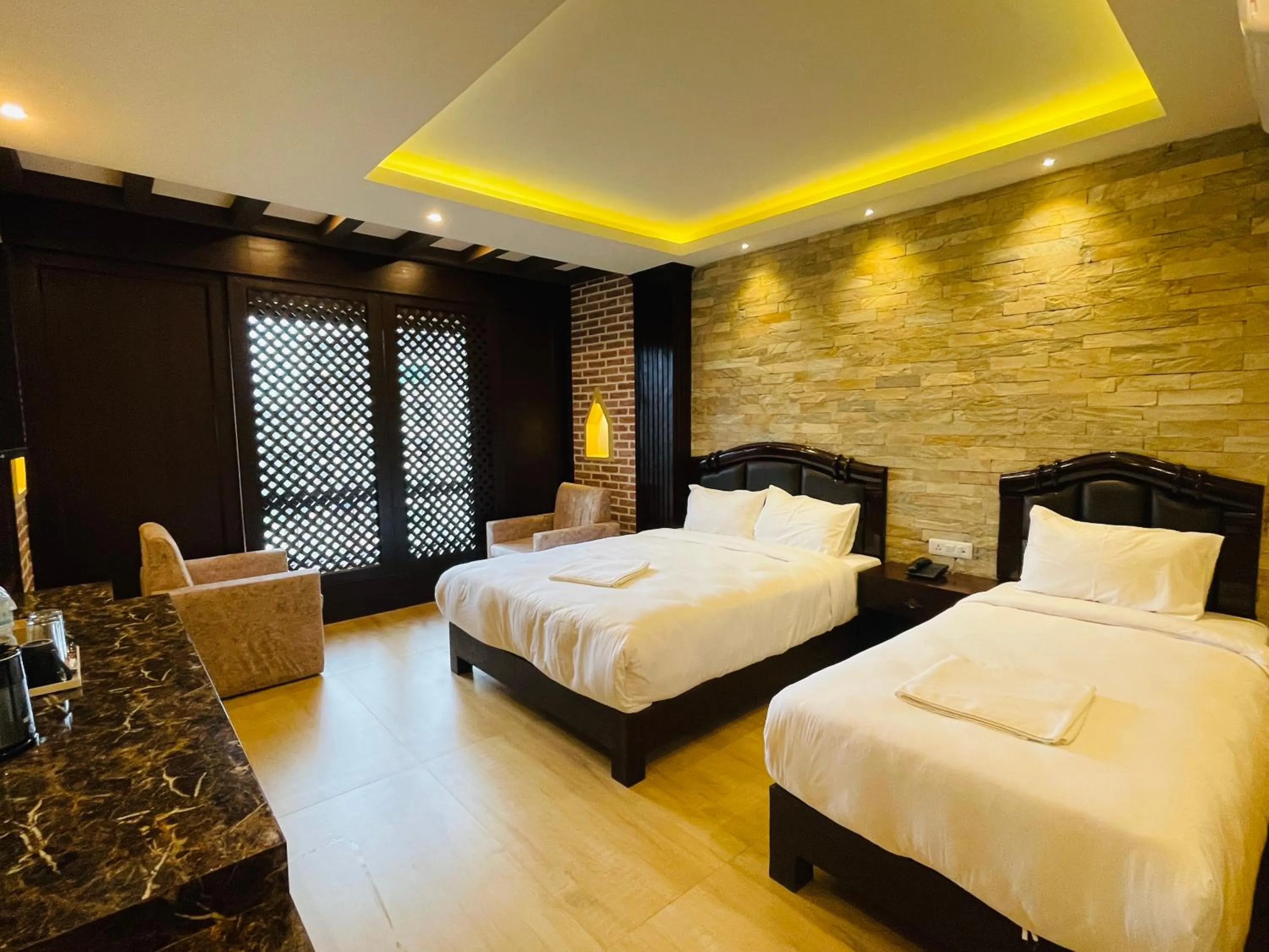 Bed in Hotel Matina Suites