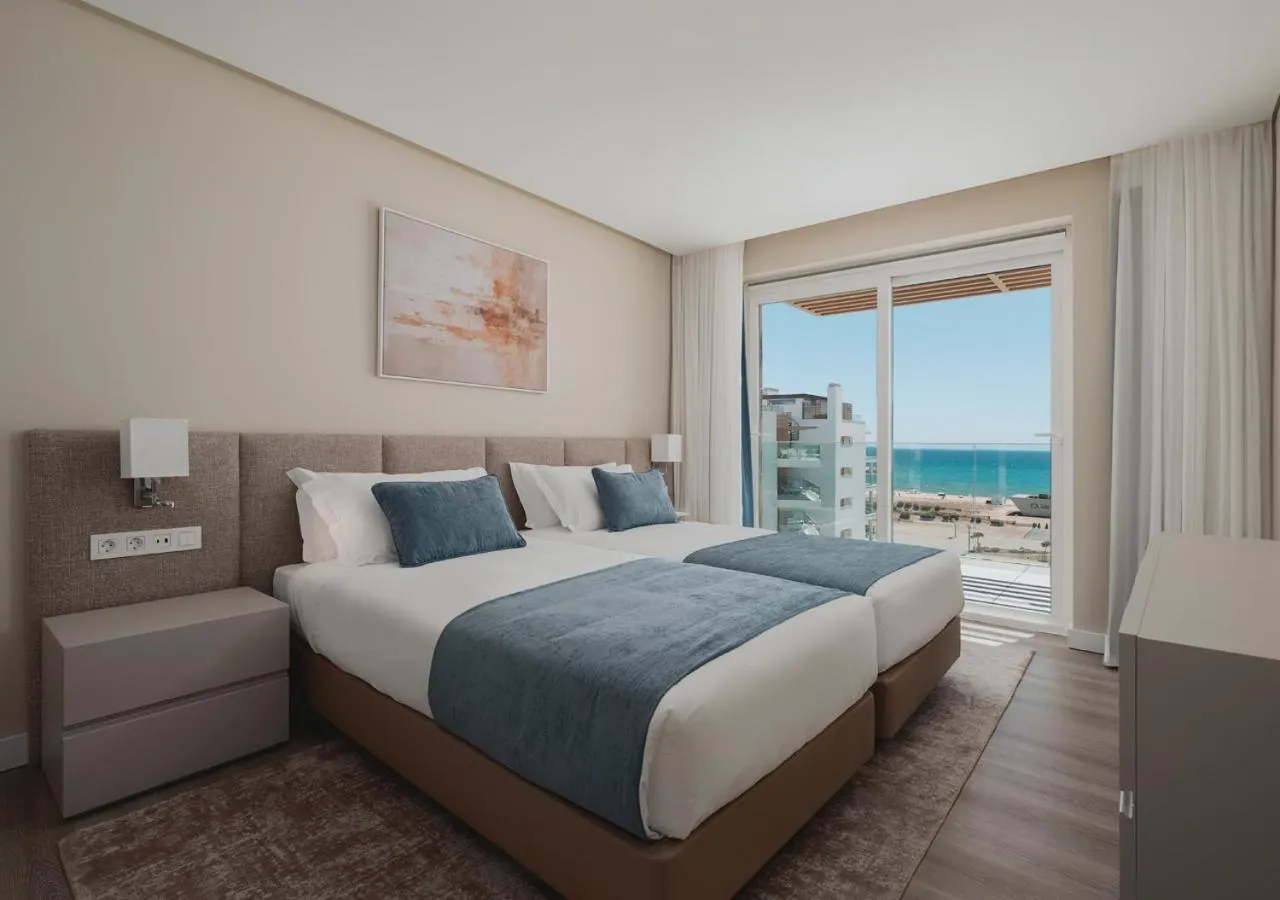 Sea view, Bed in Dom Pedro Residences