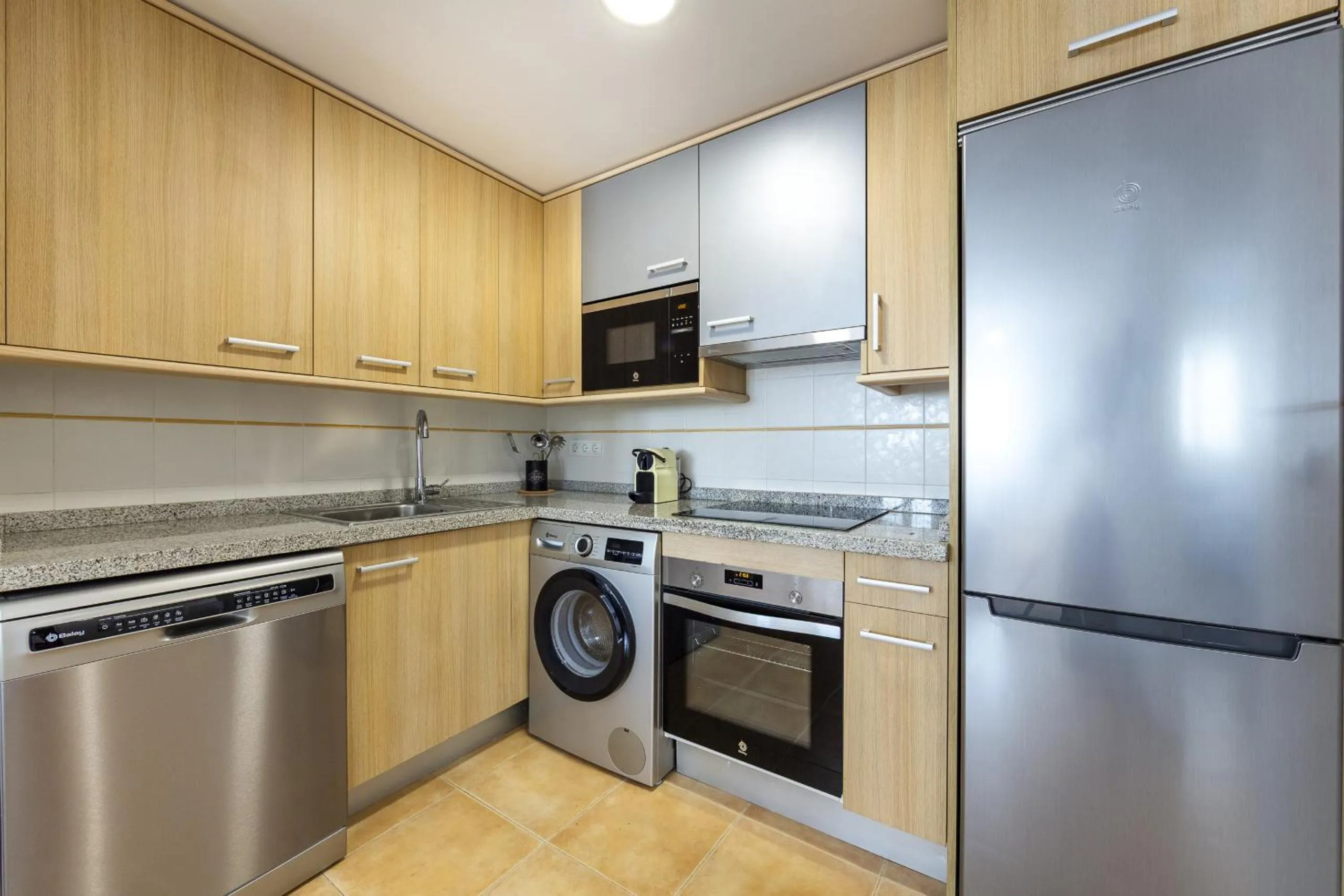 Kitchen or kitchenette in AlmeriaSuite Mojacar Breeze Apartments
