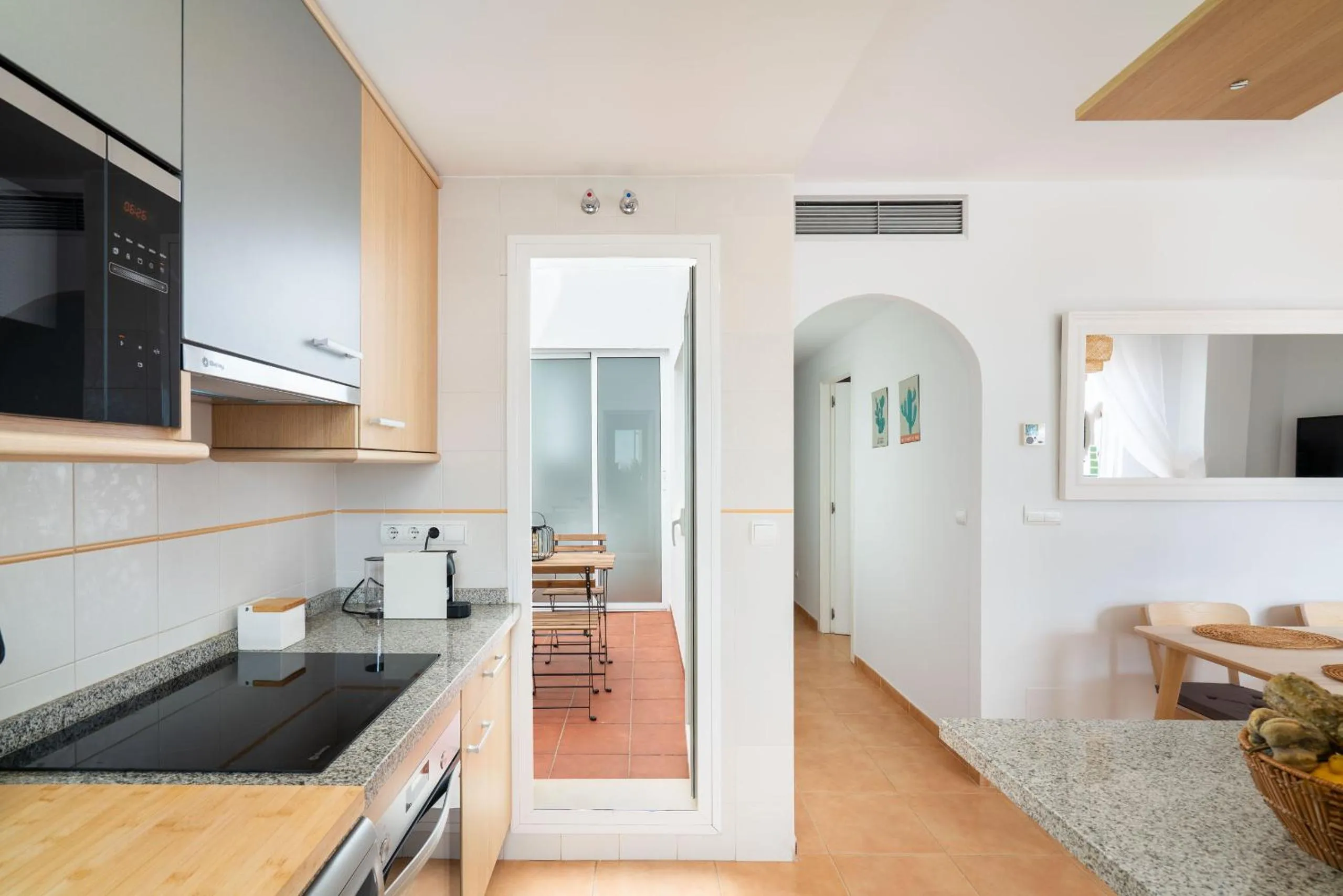 Kitchen or kitchenette in AlmeriaSuite Mojacar Breeze Apartments