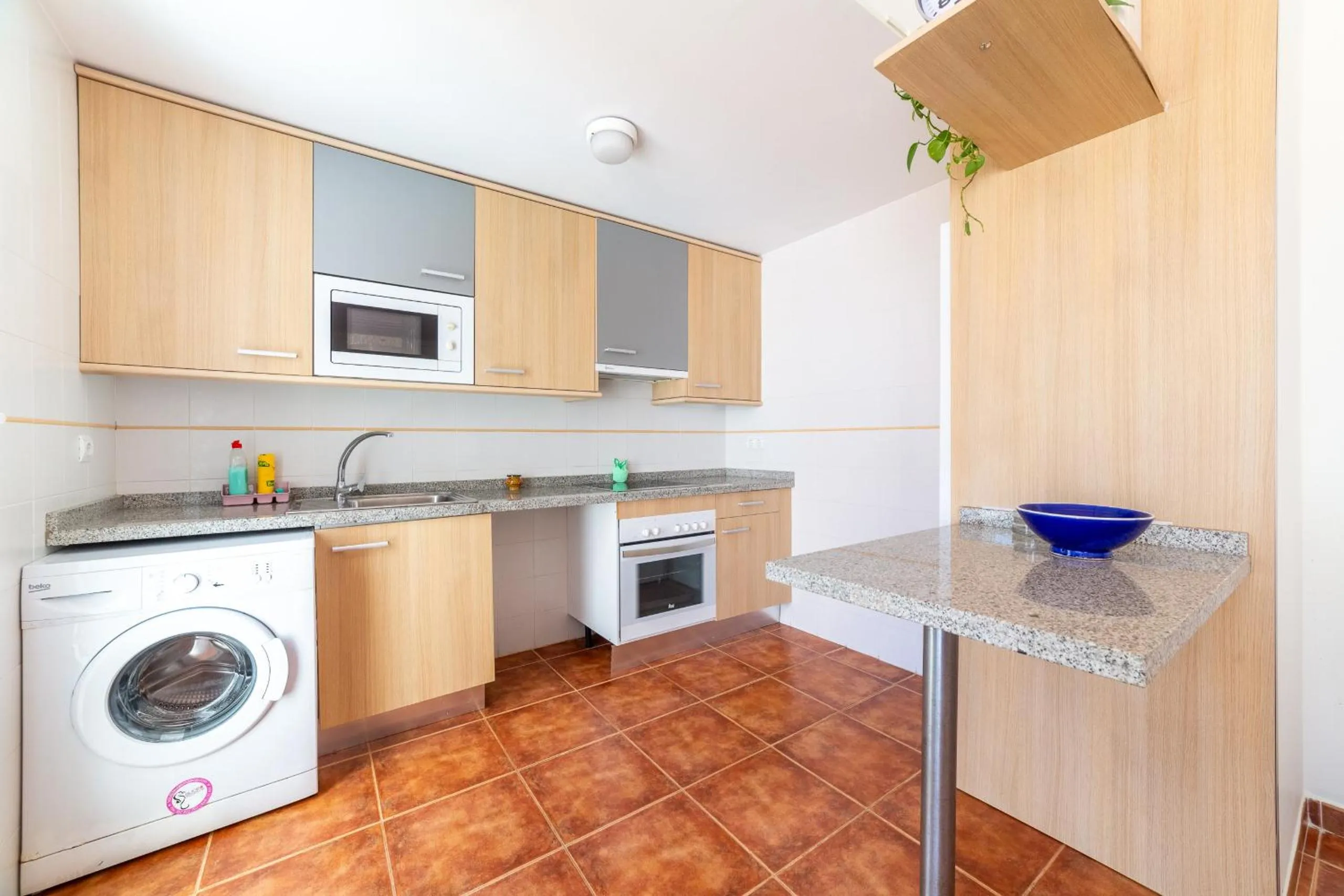 Kitchen or kitchenette in AlmeriaSuite Mojacar Breeze Apartments