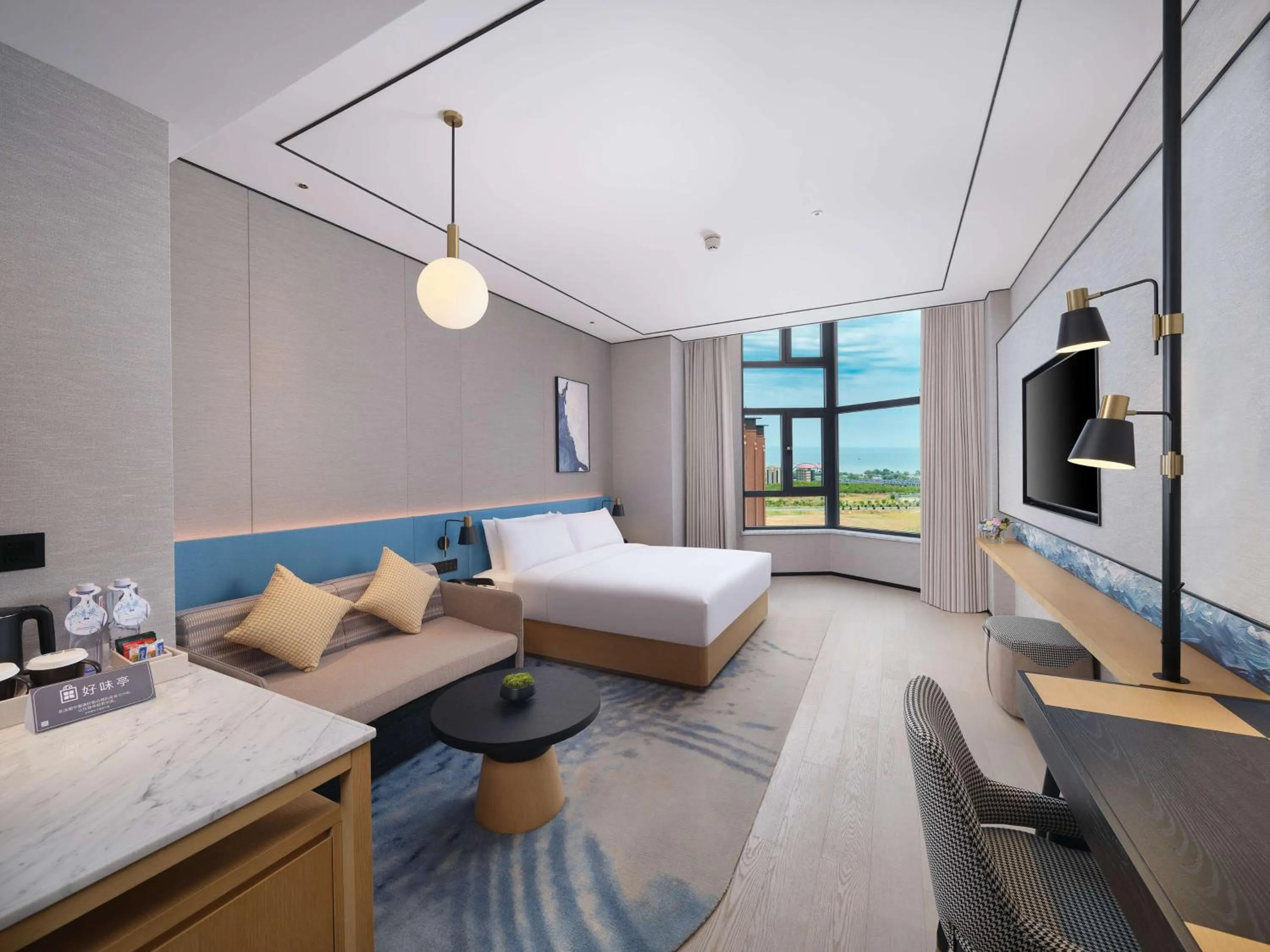 Living room, Bed in Hilton Garden Inn Huludao Longxing Road