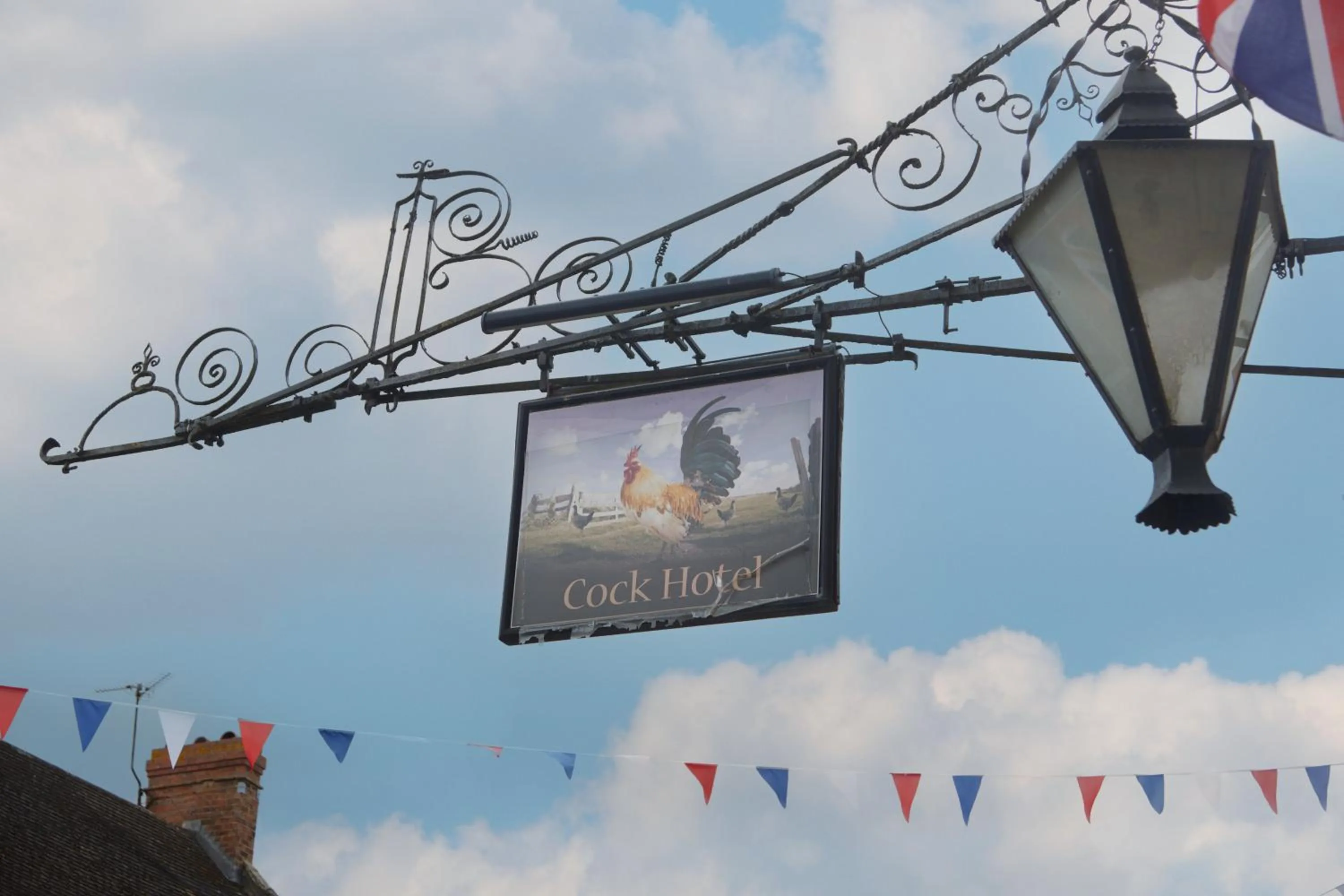 Logo/Certificate/Sign in Cock Hotel by Greene King Inns