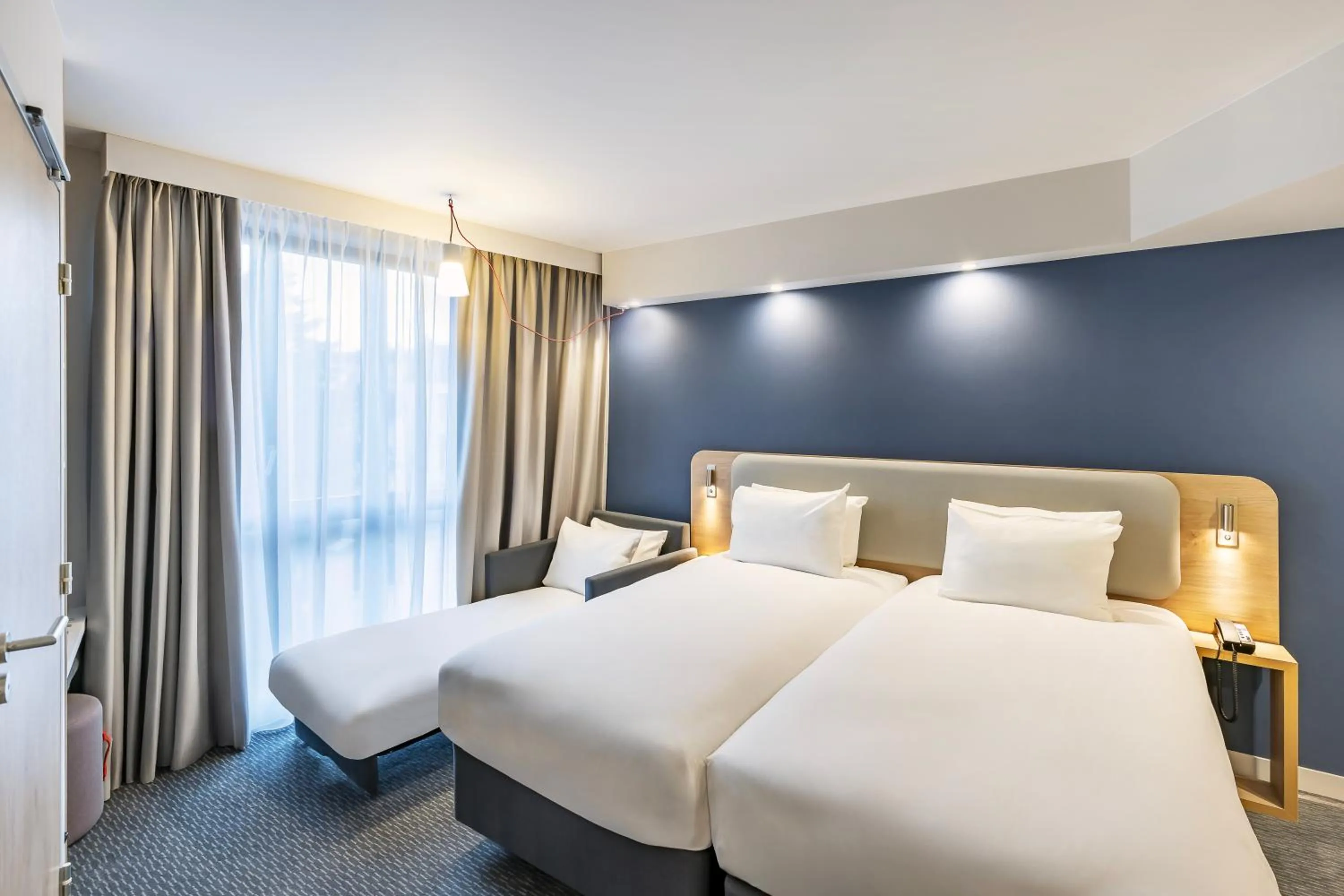 Bedroom, Bed in Holiday Inn Express Paris - Poissy by IHG