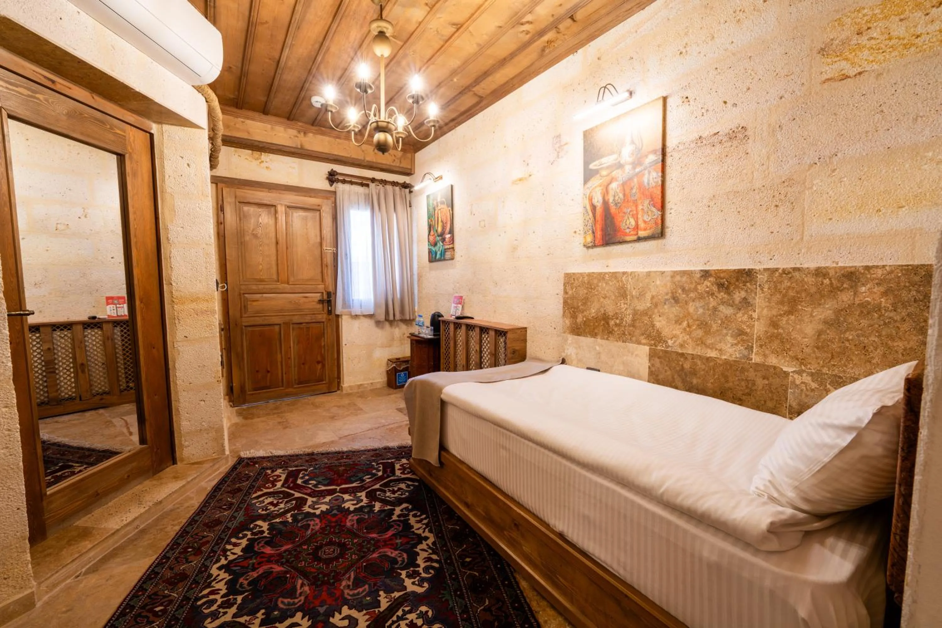 Bed in Library Cave House