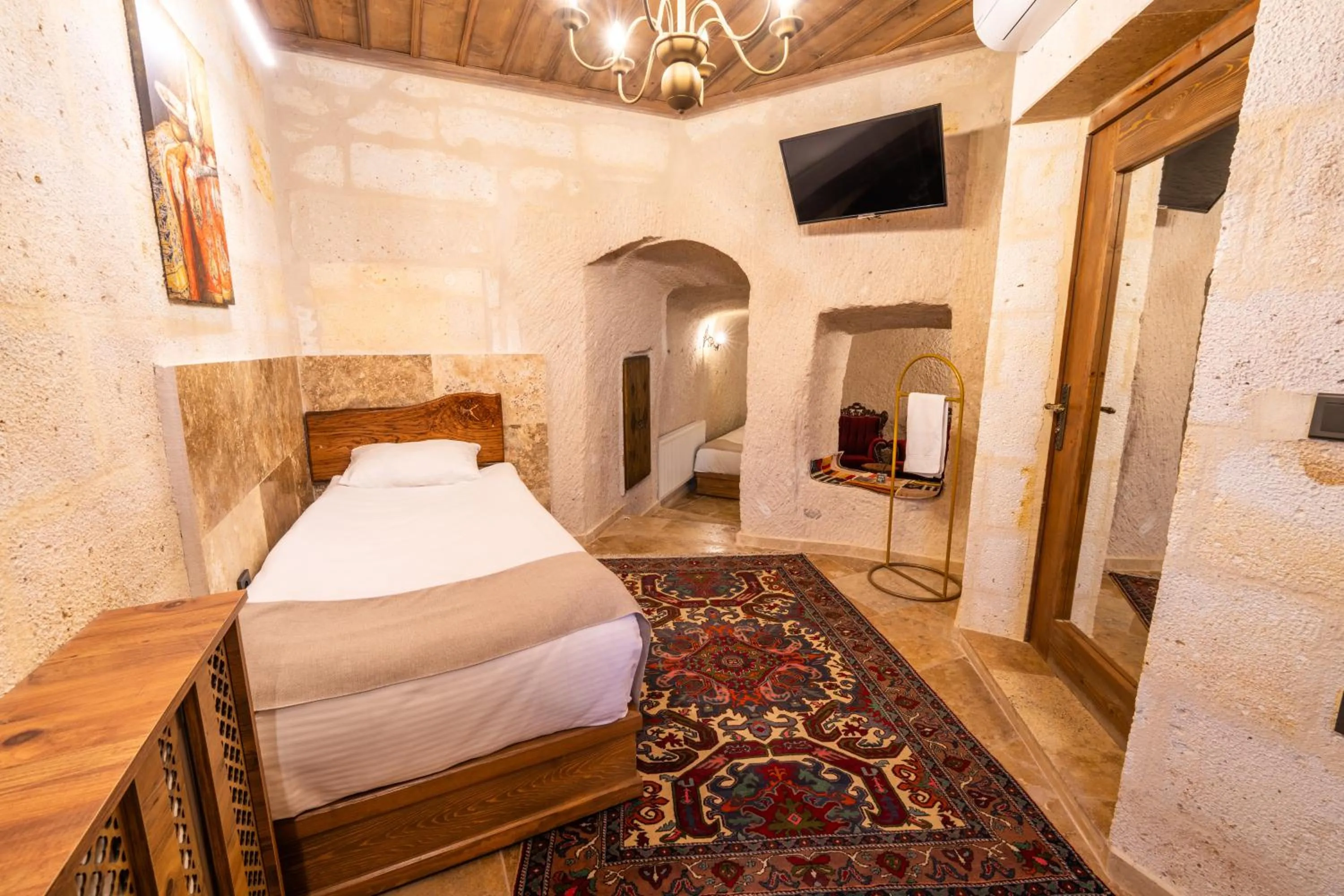 Bed in Library Cave House