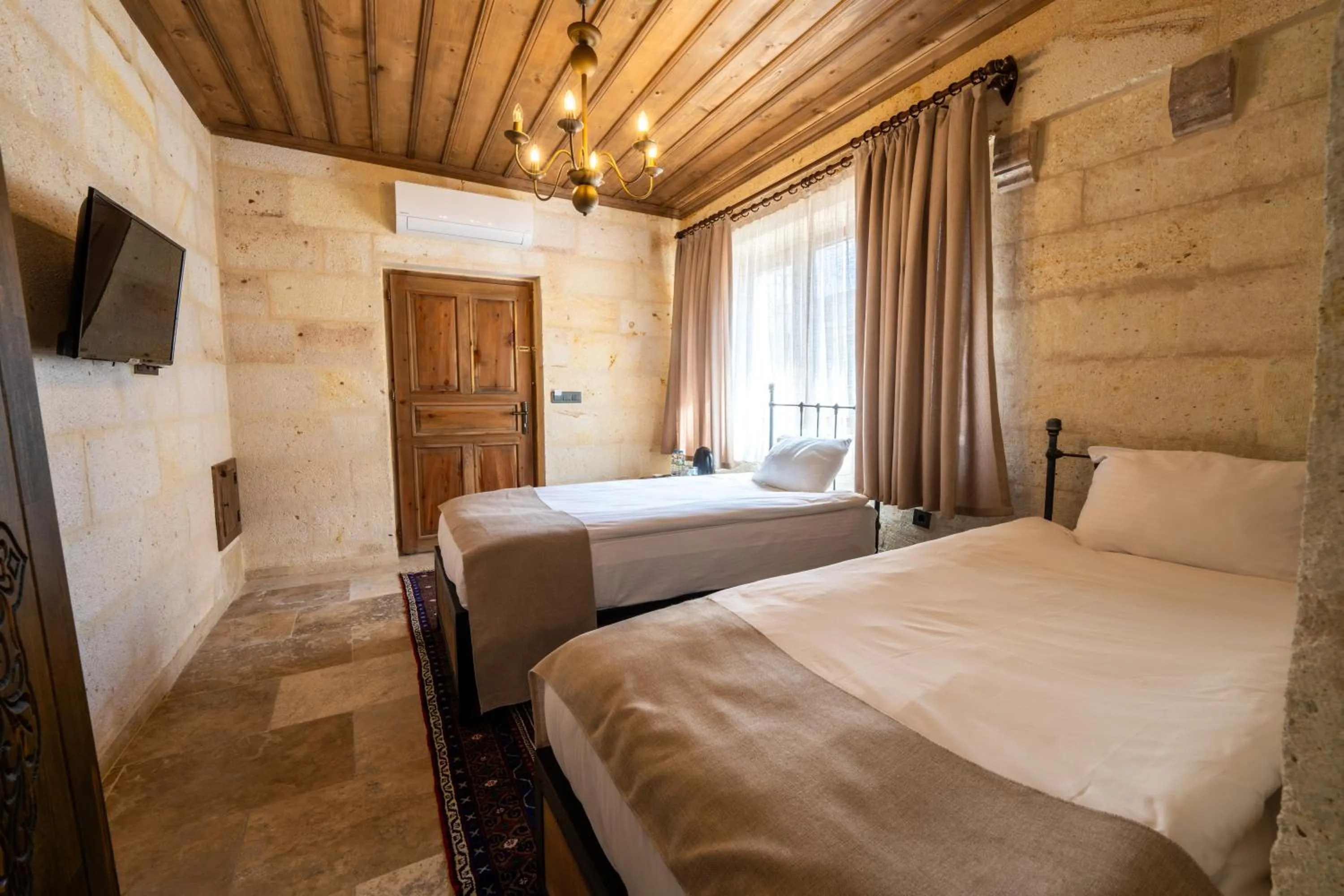 Bed in Library Cave House