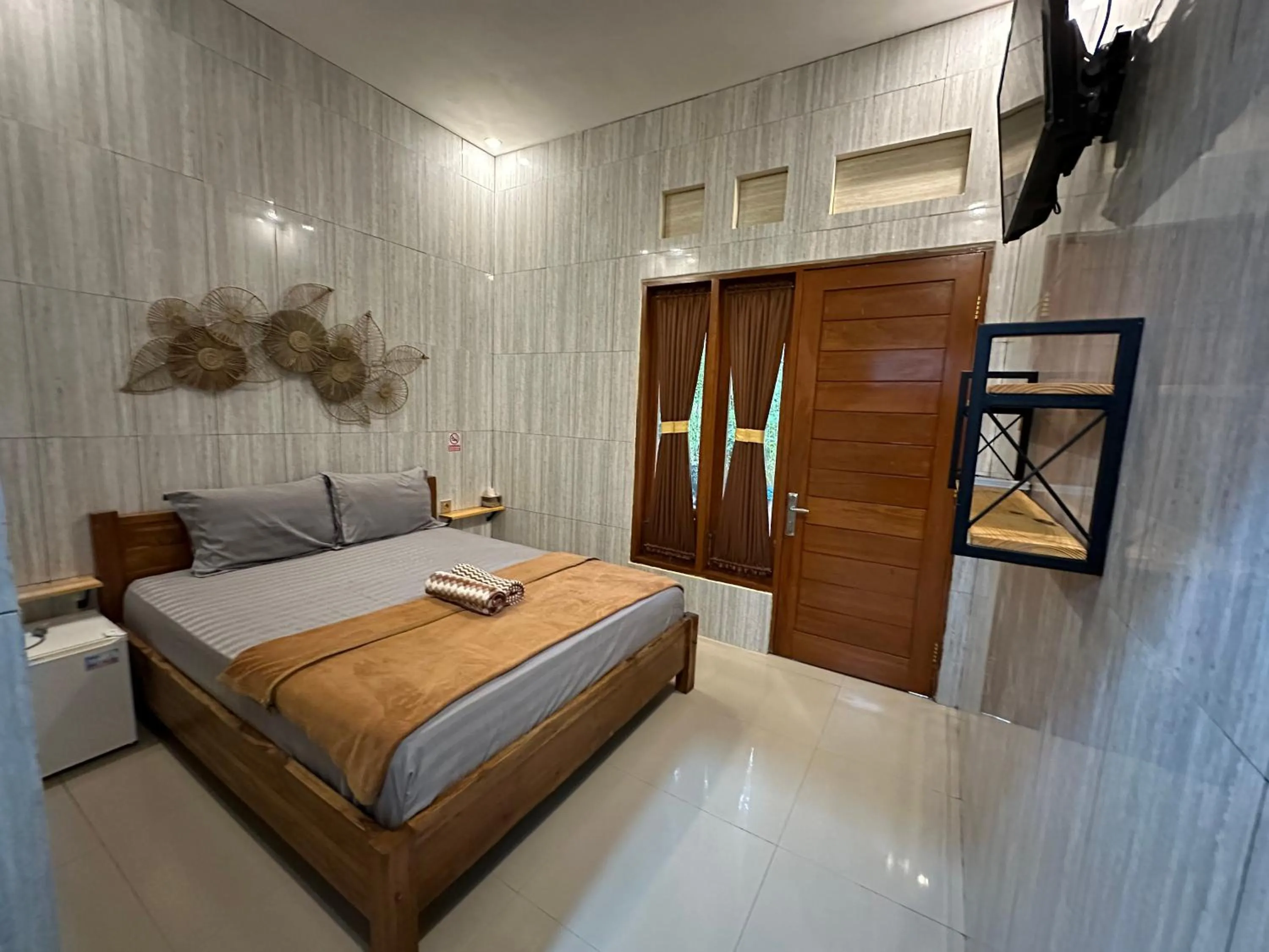 Bed in Kubu Alvian Guest House