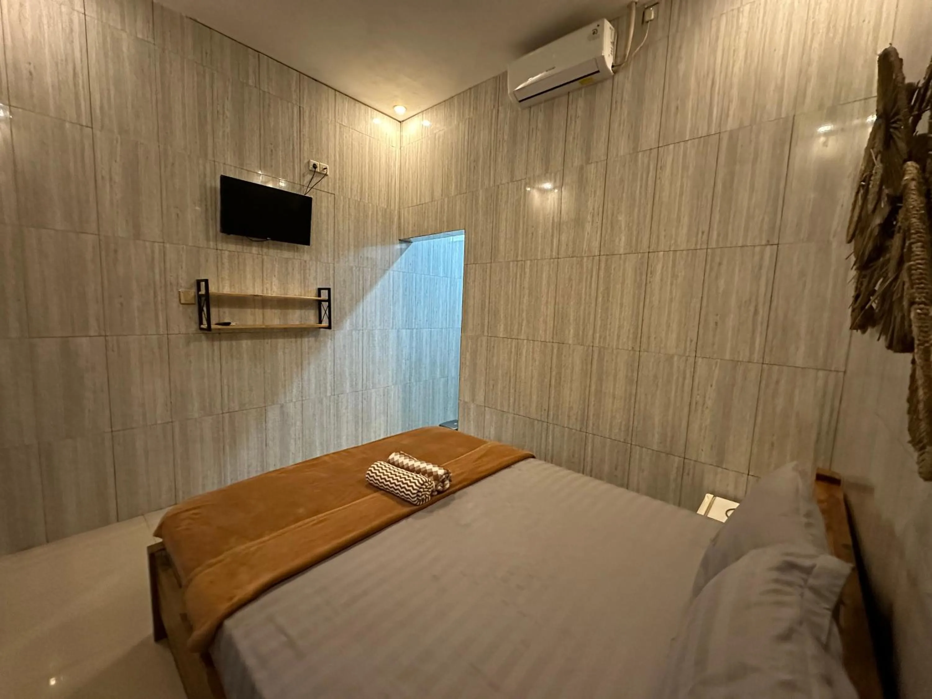 Bed in Kubu Alvian Guest House