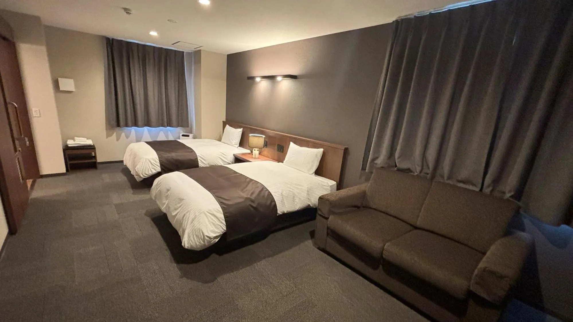 Facility for disabled guests, Bed in Sunnemu Hotel in Honjo