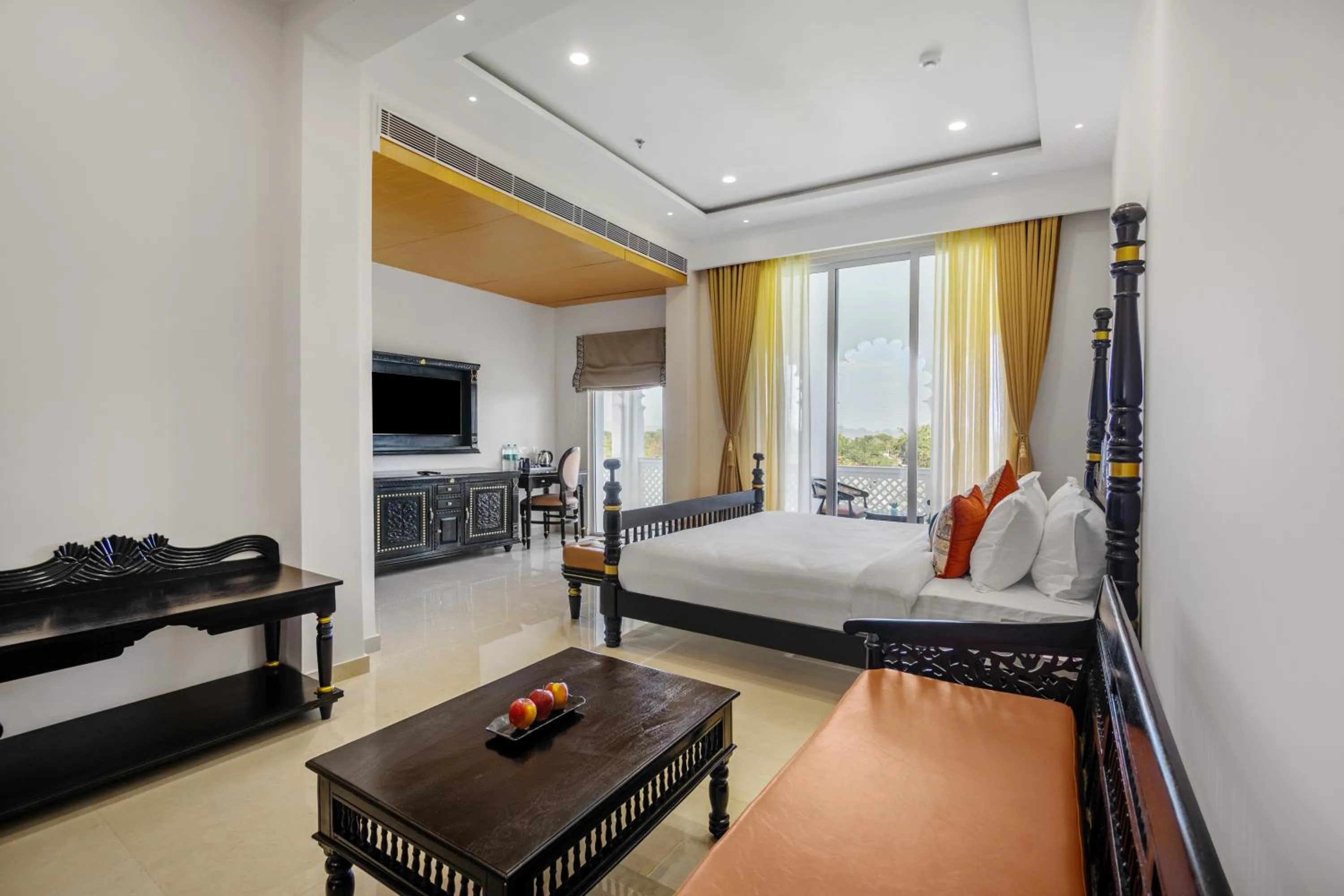 Seating area, Bed in Sterling Aravalli Udaipur