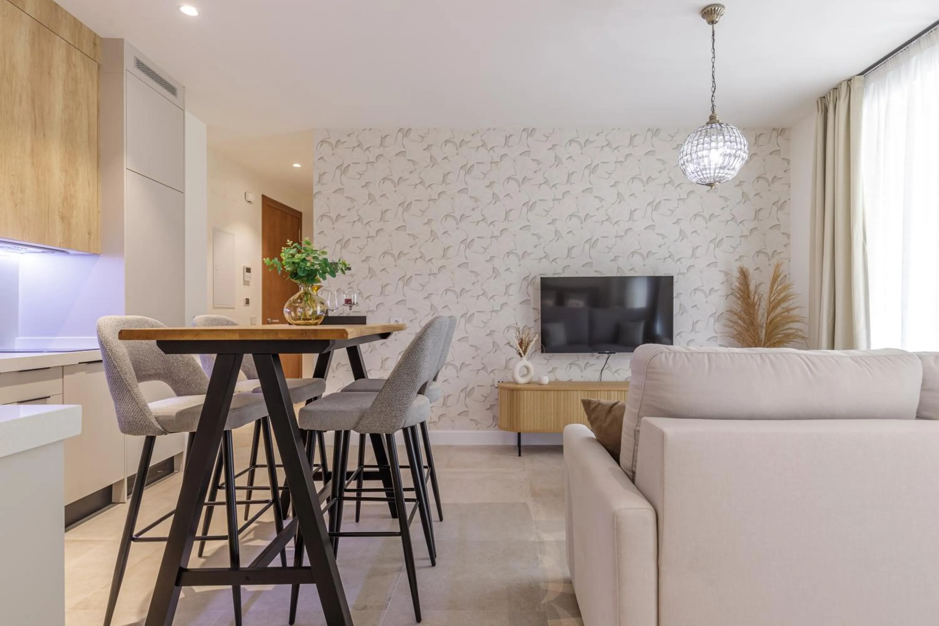 TV and multimedia in Plaza del Siglo Suites & Boutique Apartments by Caleta Homes