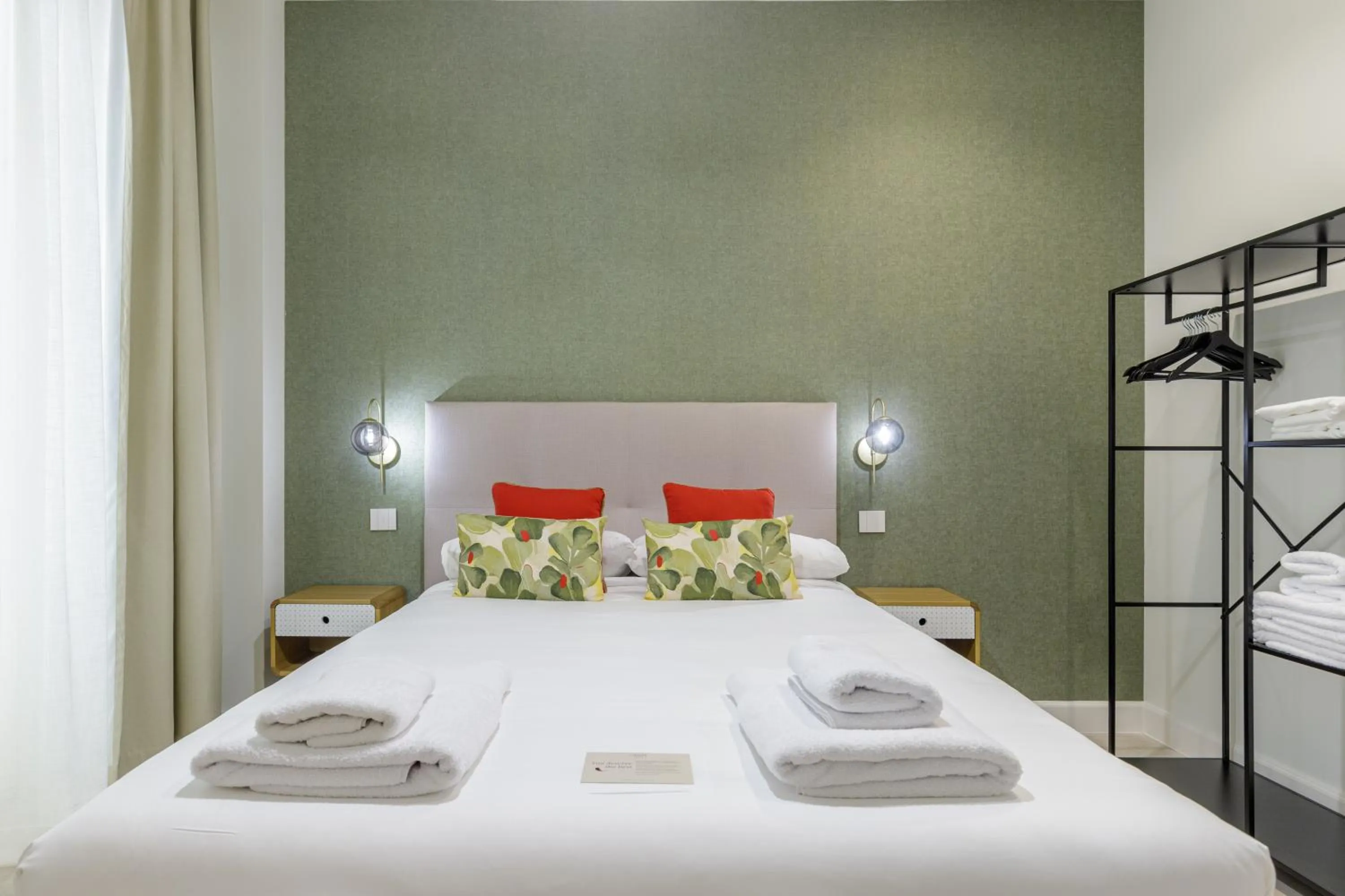 Bed in Plaza del Siglo Suites & Boutique Apartments by Caleta Homes
