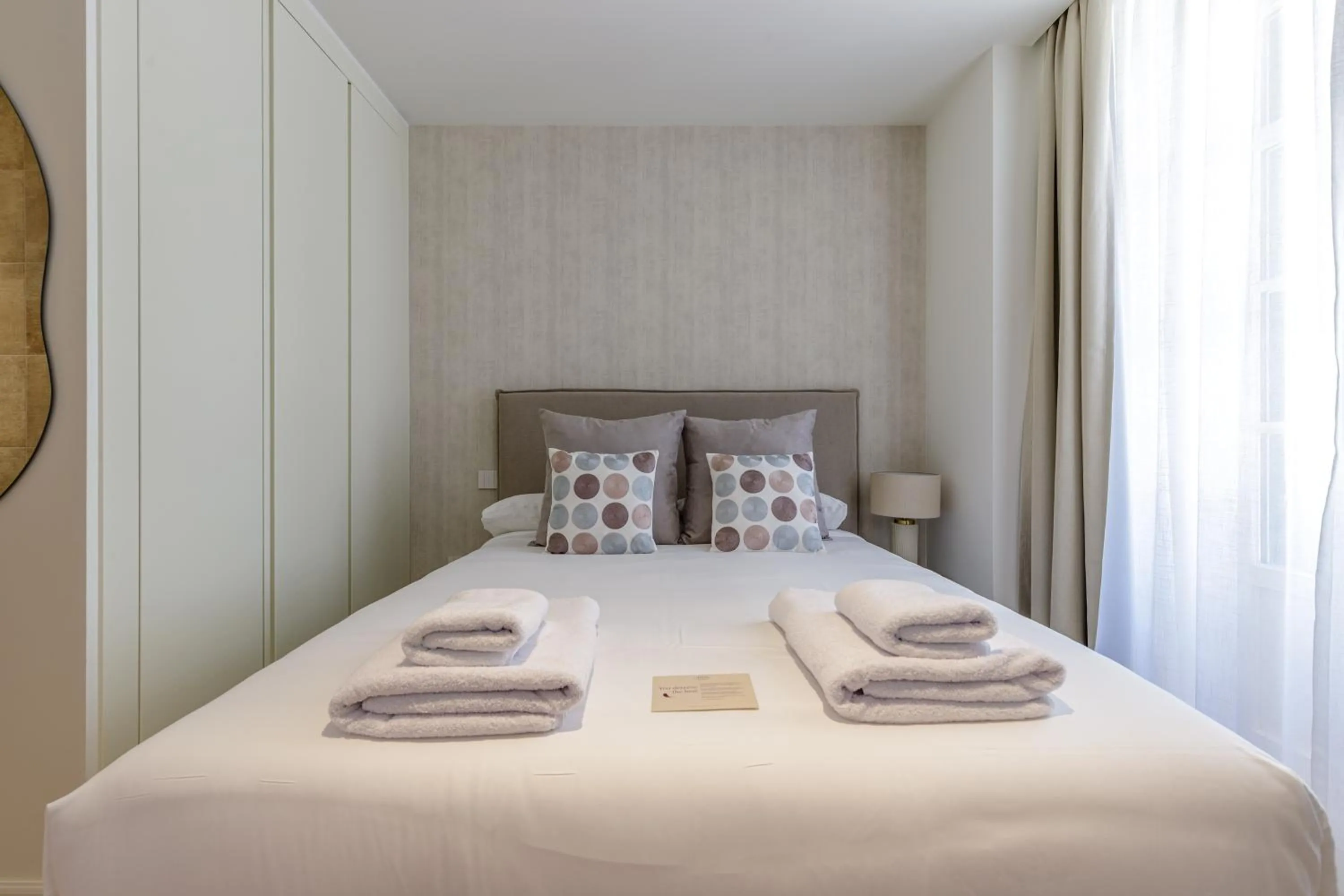 Bed in Plaza del Siglo Suites & Boutique Apartments by Caleta Homes