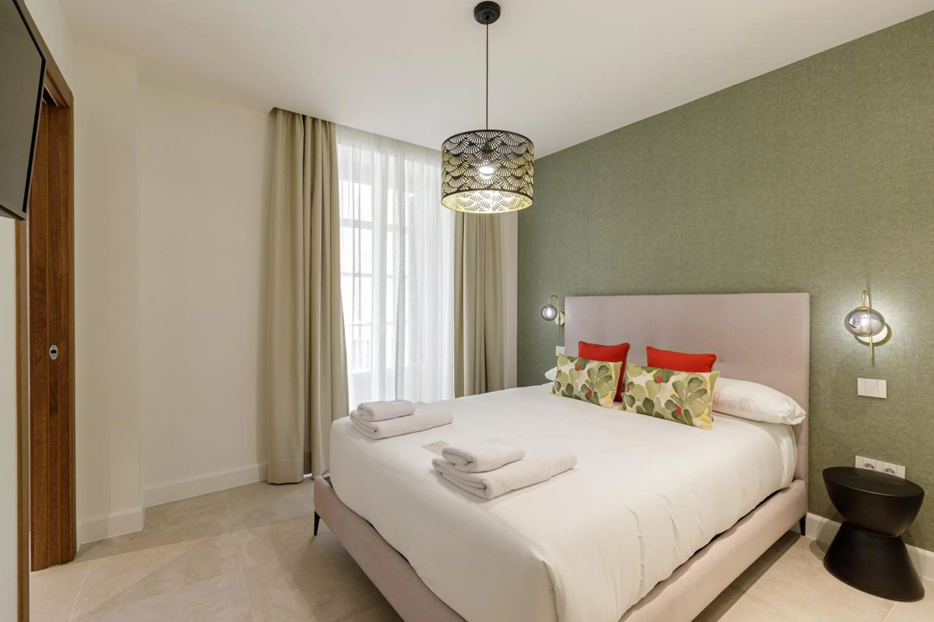 Bed in Plaza del Siglo Suites & Boutique Apartments by Caleta Homes