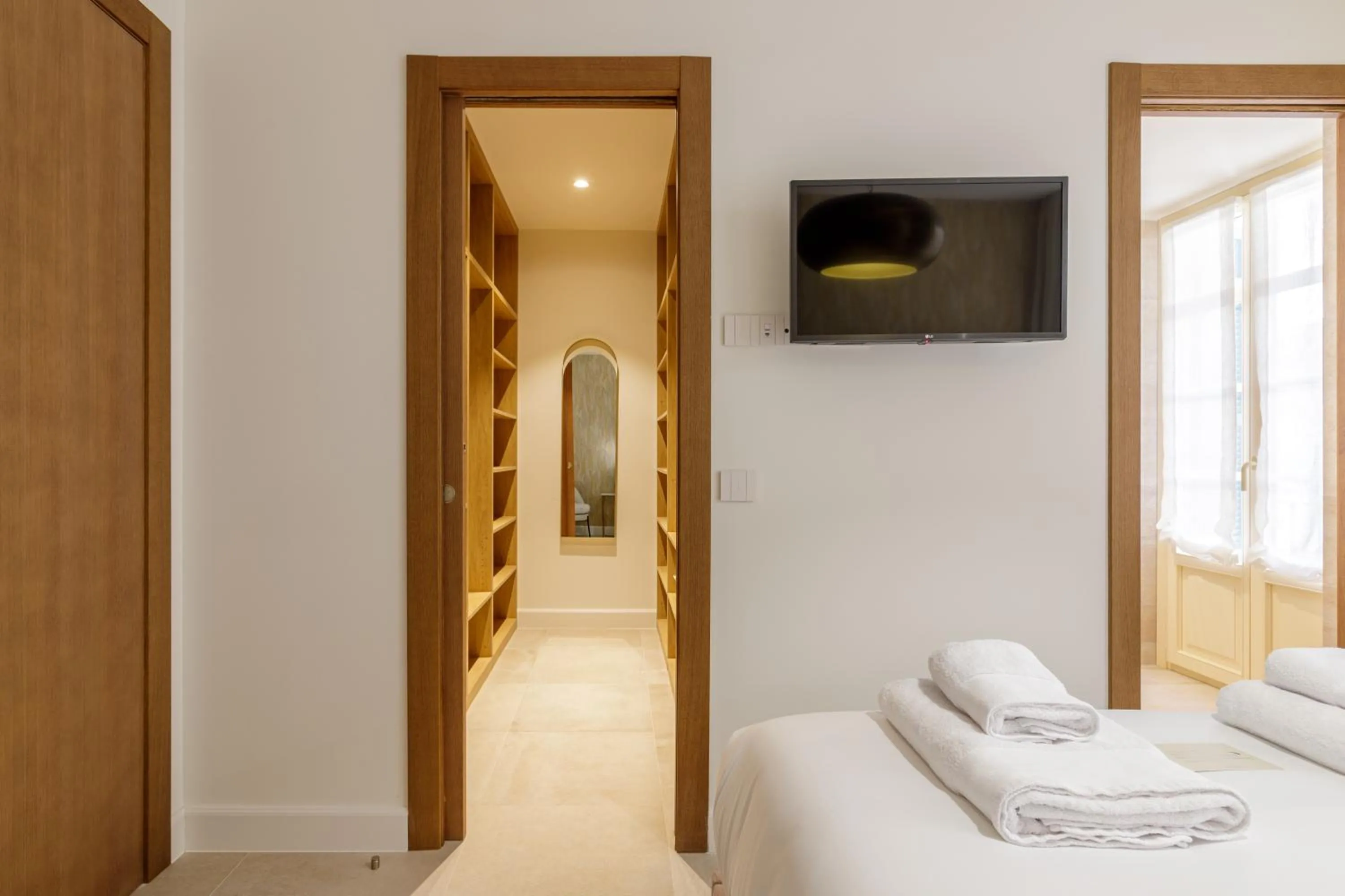 Bed in Plaza del Siglo Suites & Boutique Apartments by Caleta Homes