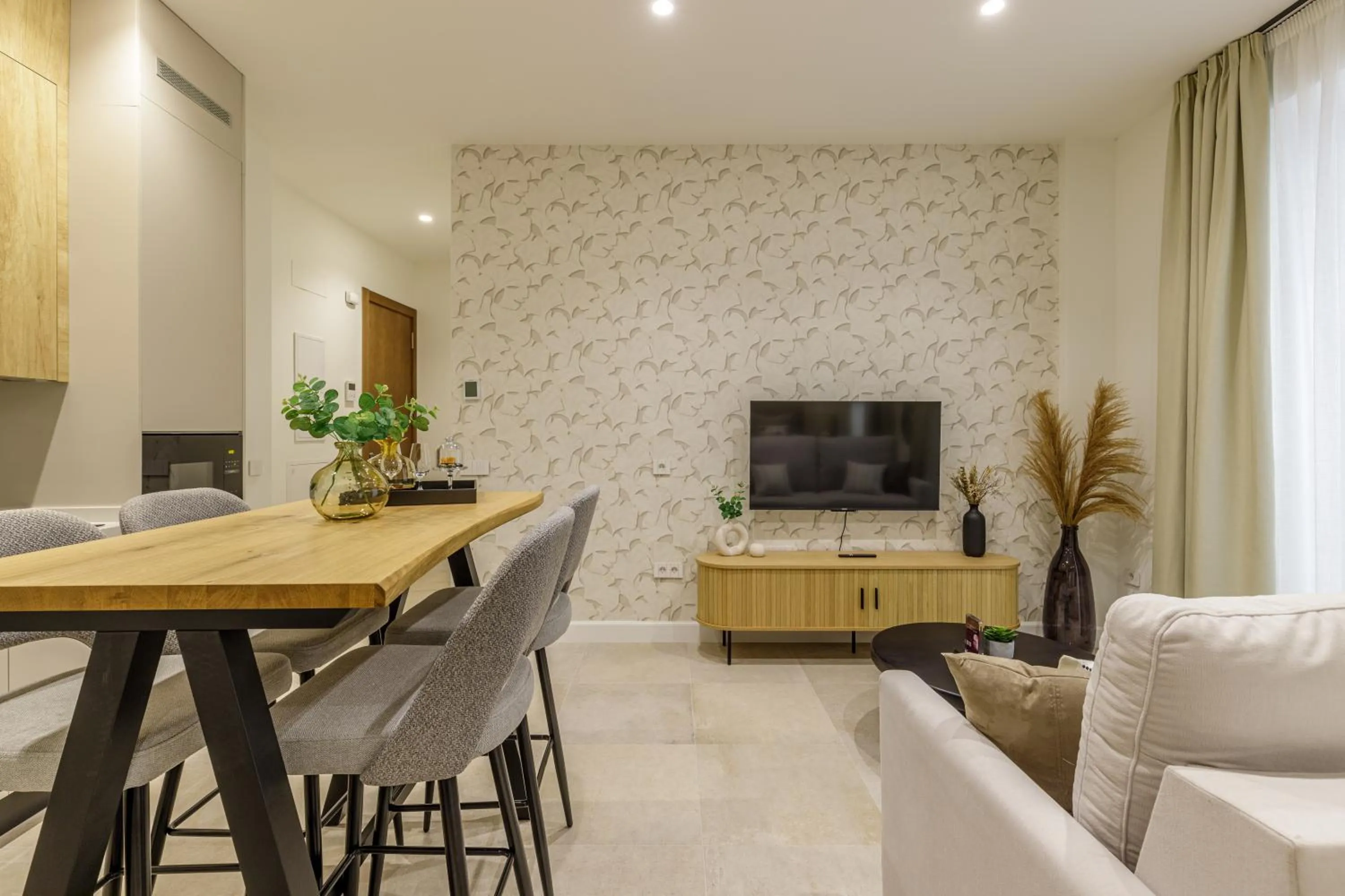 Communal lounge/ TV room in Plaza del Siglo Suites & Boutique Apartments by Caleta Homes