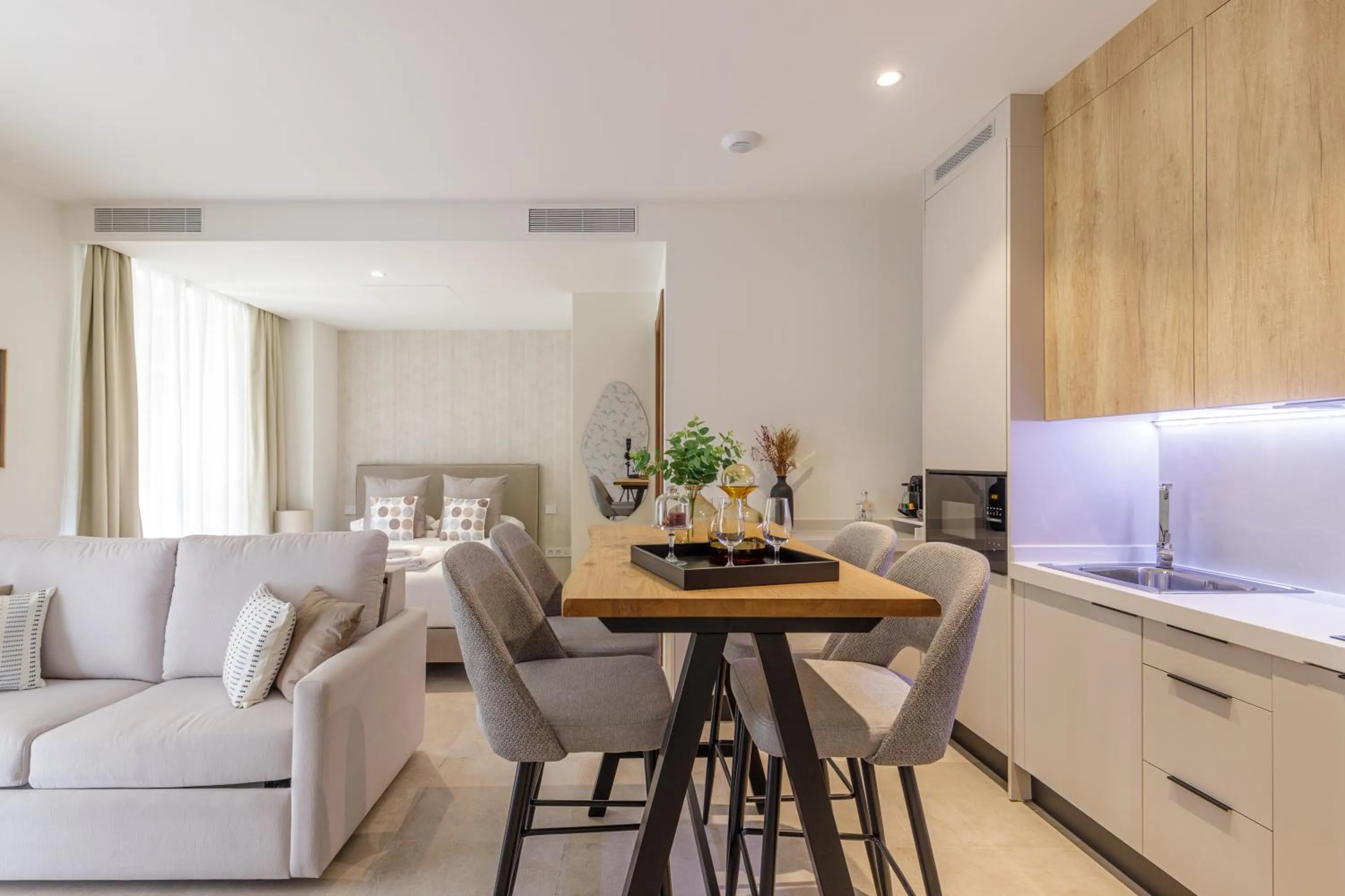Kitchen or kitchenette in Plaza del Siglo Suites & Boutique Apartments by Caleta Homes