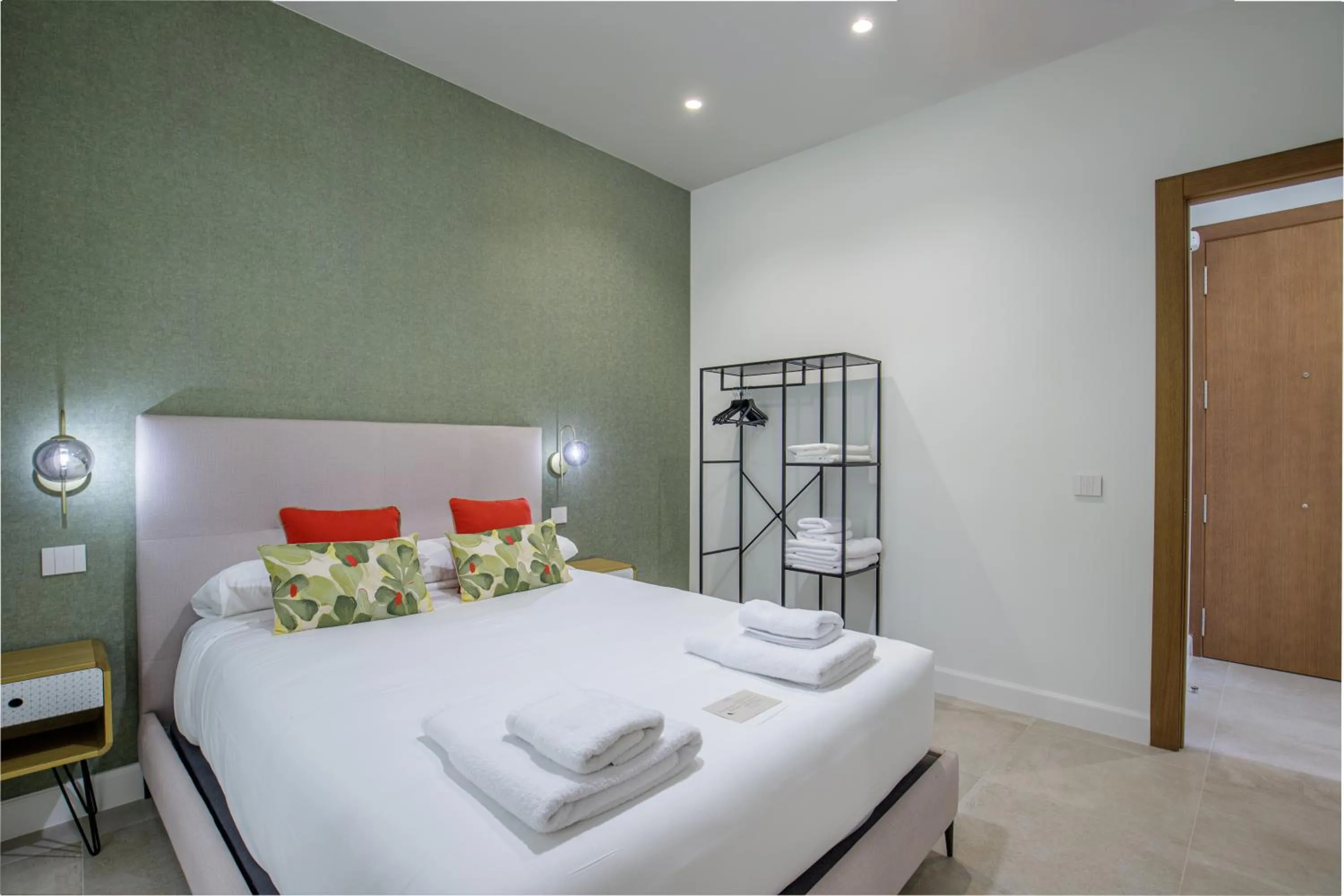 Bed in Plaza del Siglo Suites & Boutique Apartments by Caleta Homes