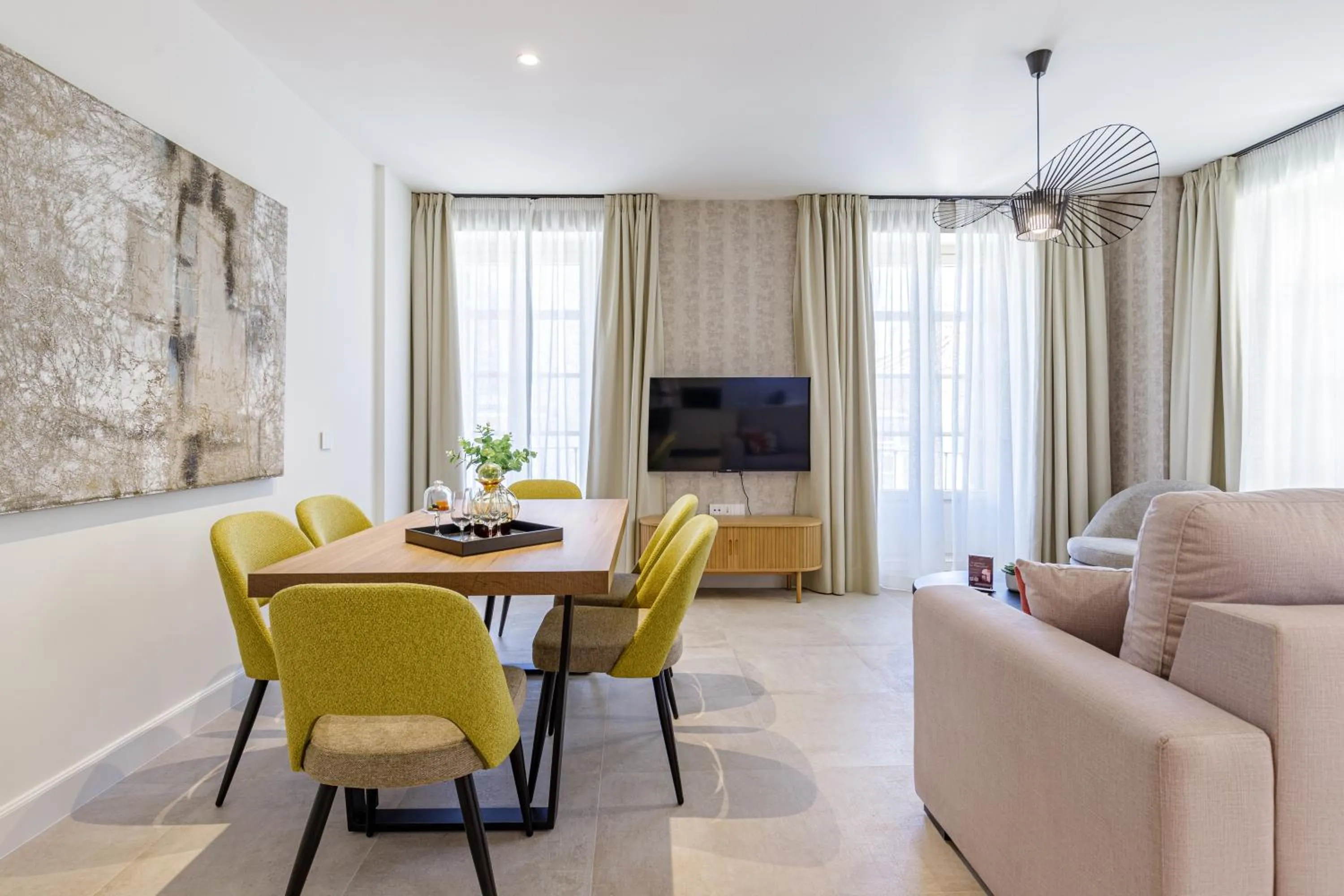 Communal lounge/ TV room in Plaza del Siglo Suites & Boutique Apartments by Caleta Homes