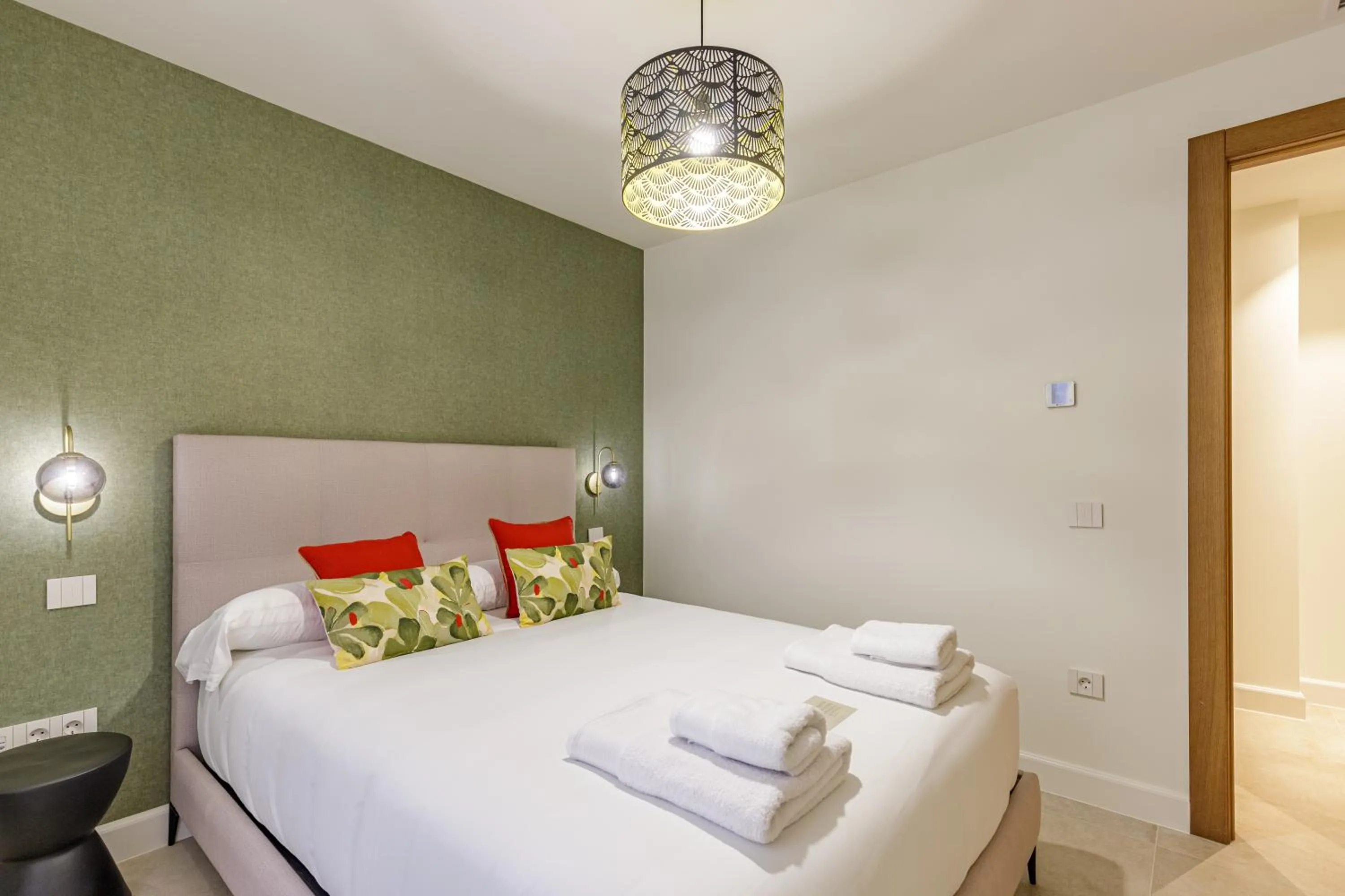 Bed in Plaza del Siglo Suites & Boutique Apartments by Caleta Homes