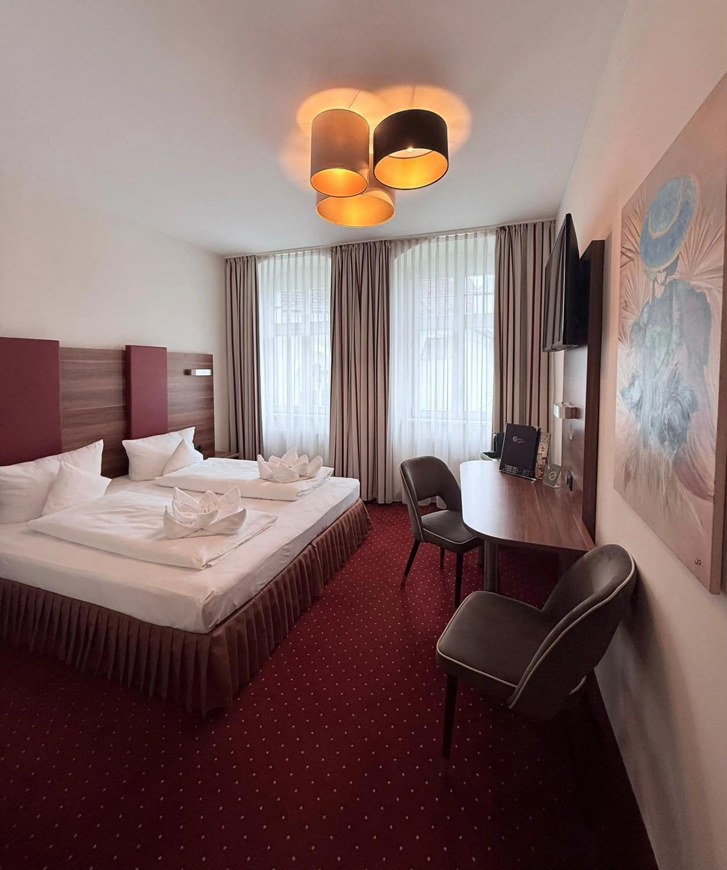 Photo of the whole room, Bed in Hotel Schwibbogen Altstadt & Apartments