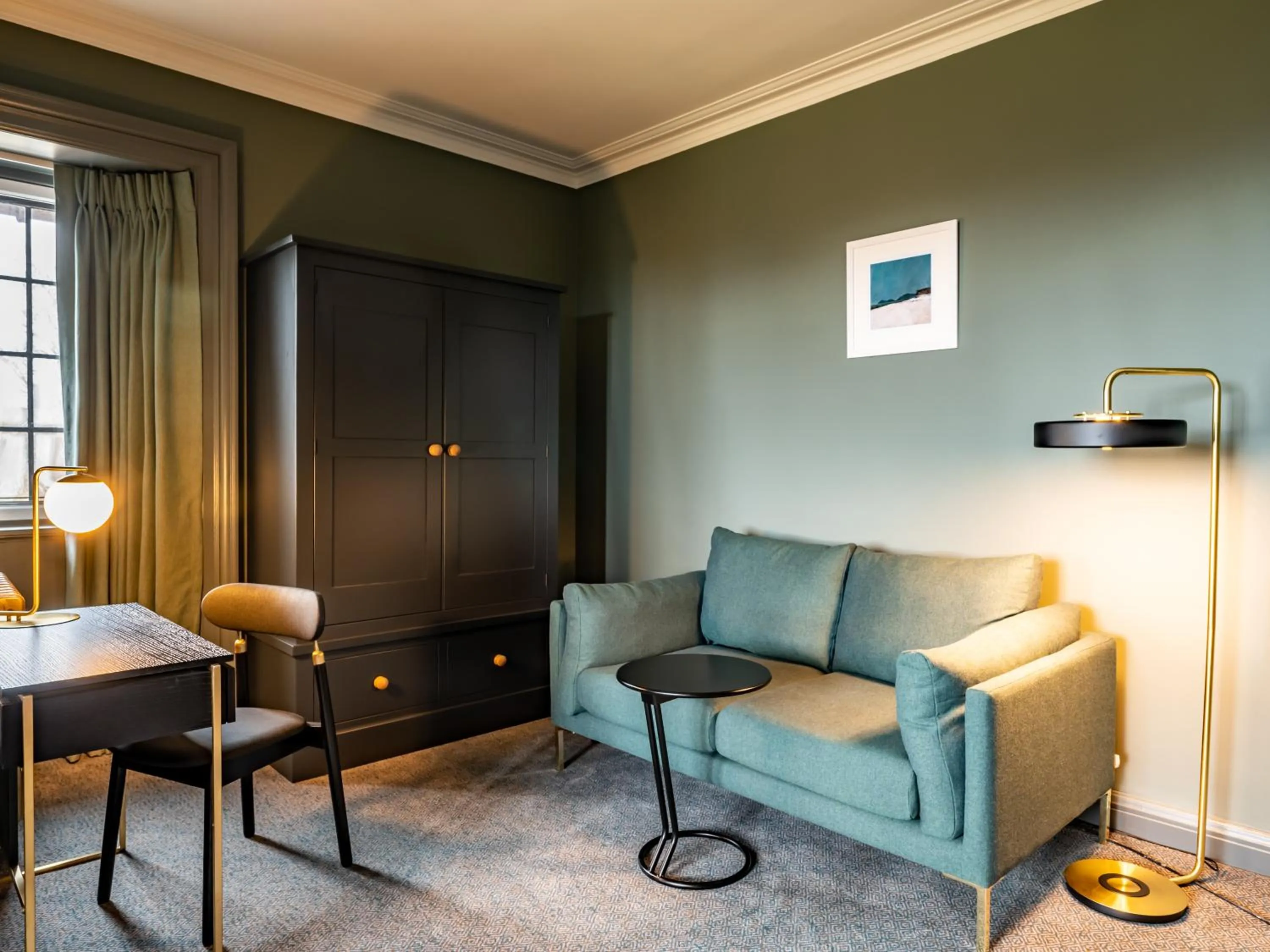 Living room in Royal Marine Hotel, by Highland Coast Hotels