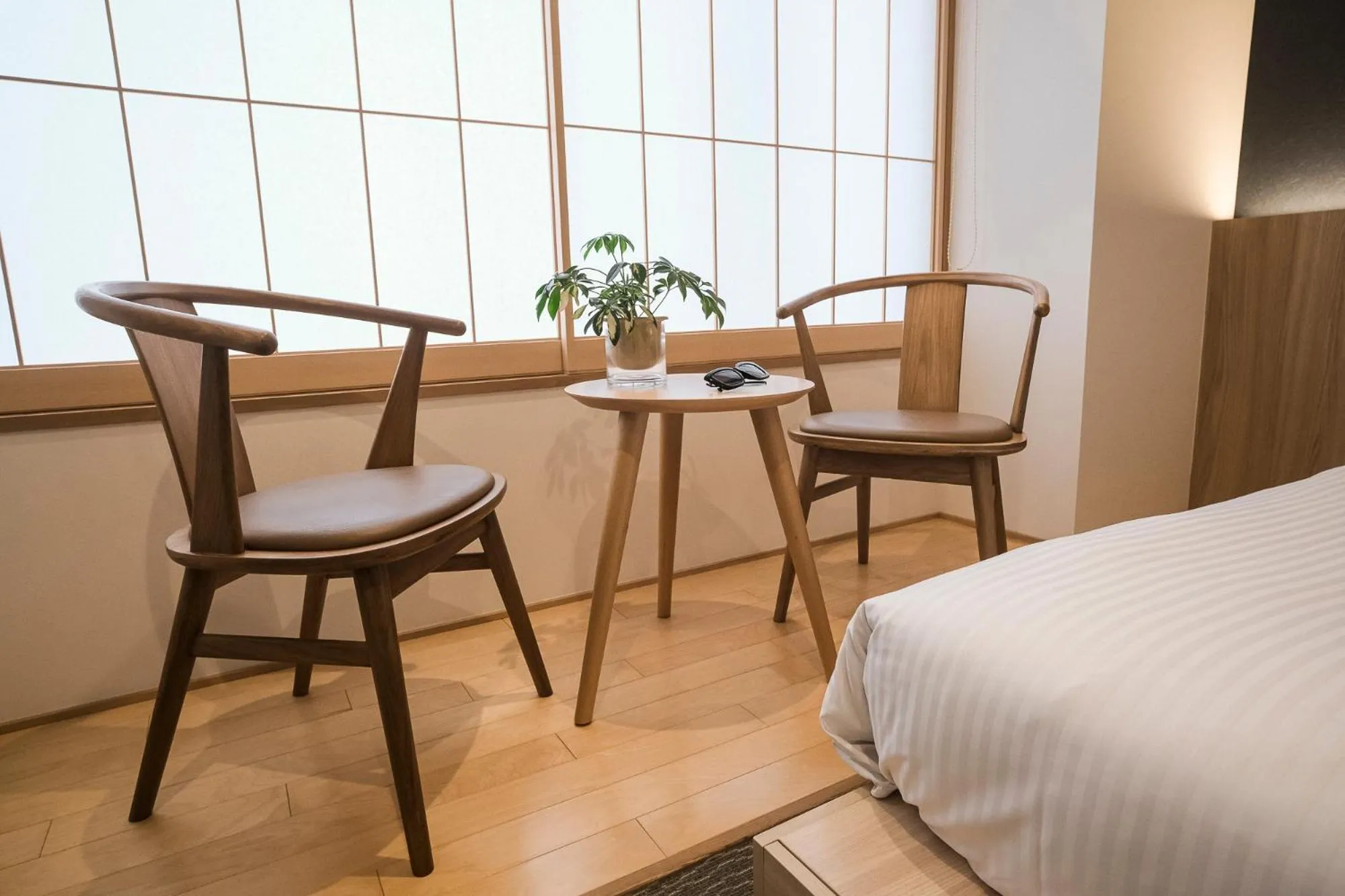 Seating area, Bed in WAYFARER Shin