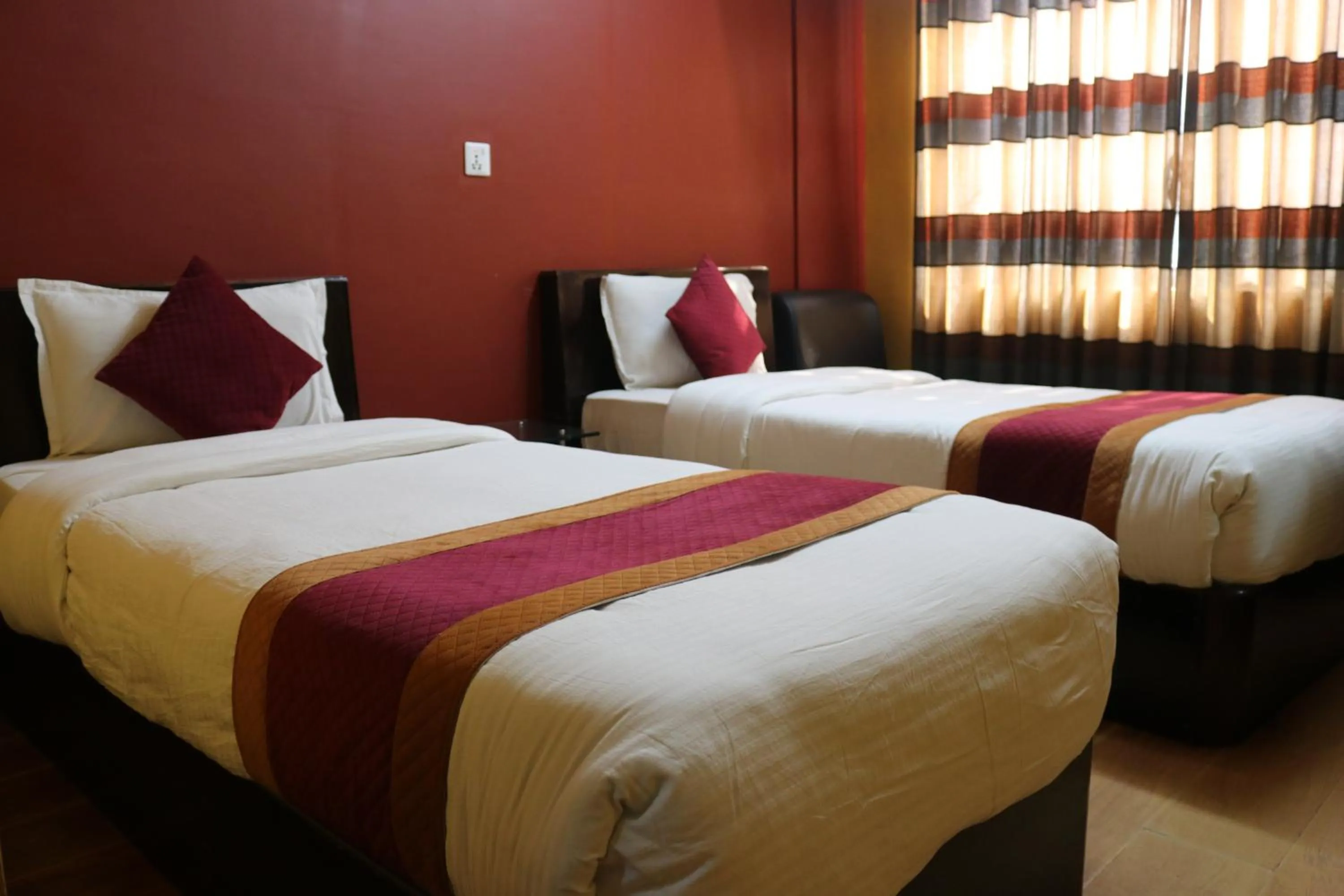 Bed in Hotel Pashupati Plaza