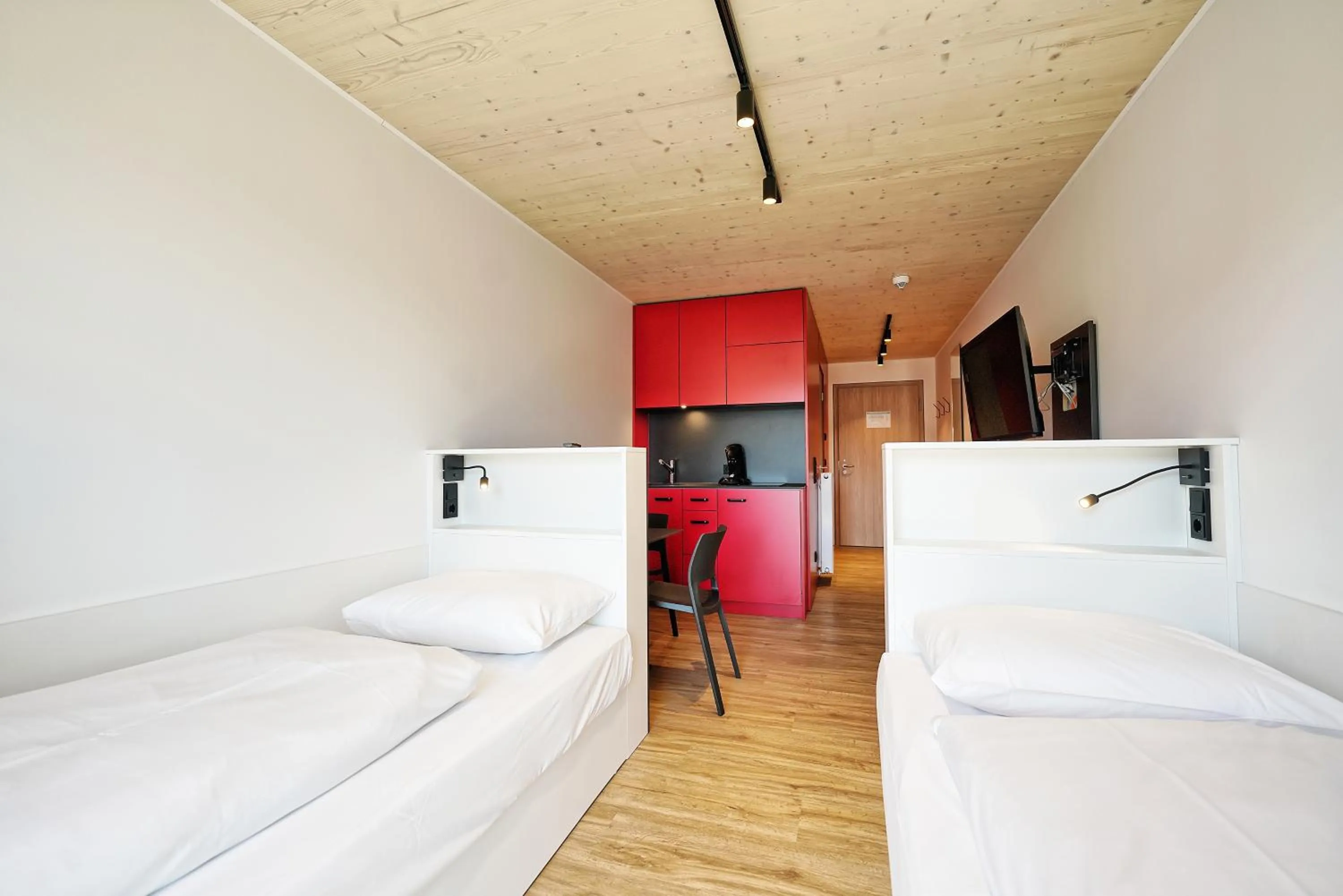 Photo of the whole room, Bed in Timber One Boardinghouse Dorfen
