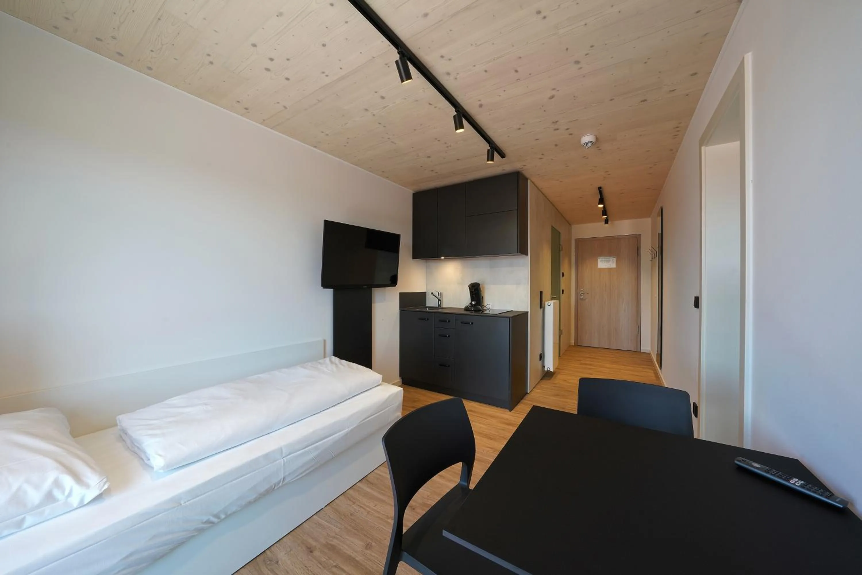 Photo of the whole room, Bed in Timber One Boardinghouse Dorfen