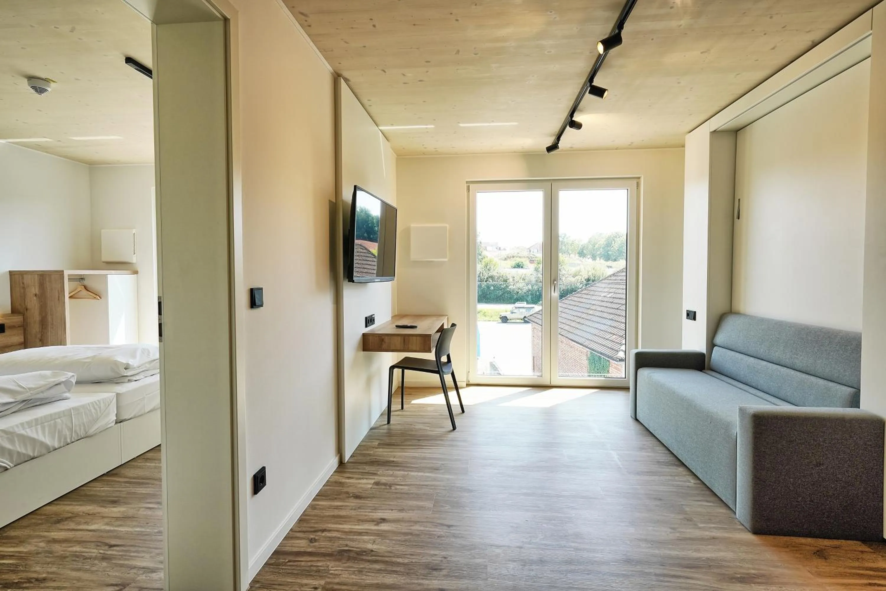 Photo of the whole room, Bed in Timber One Boardinghouse Dorfen