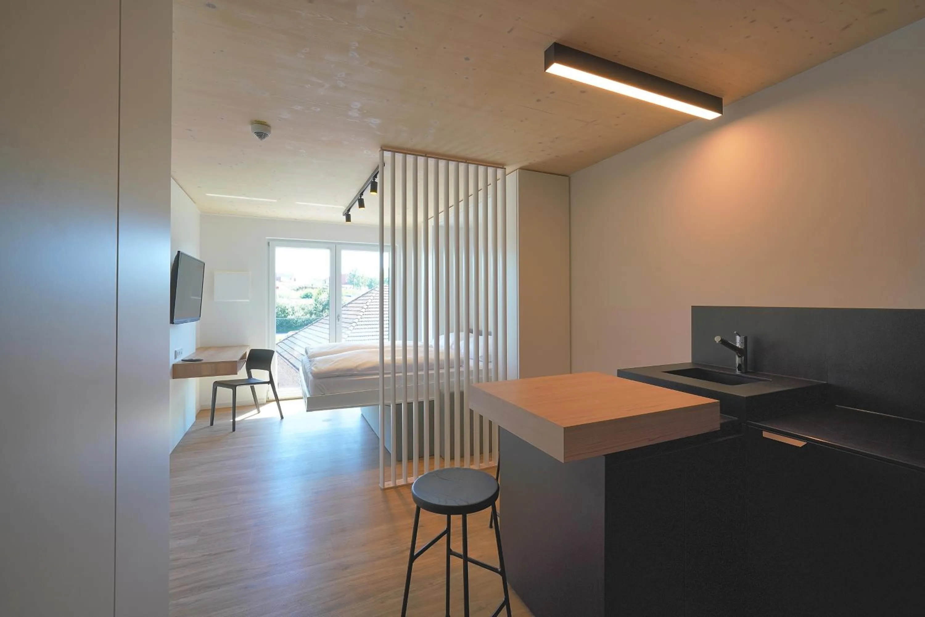 Photo of the whole room in Timber One Boardinghouse Dorfen