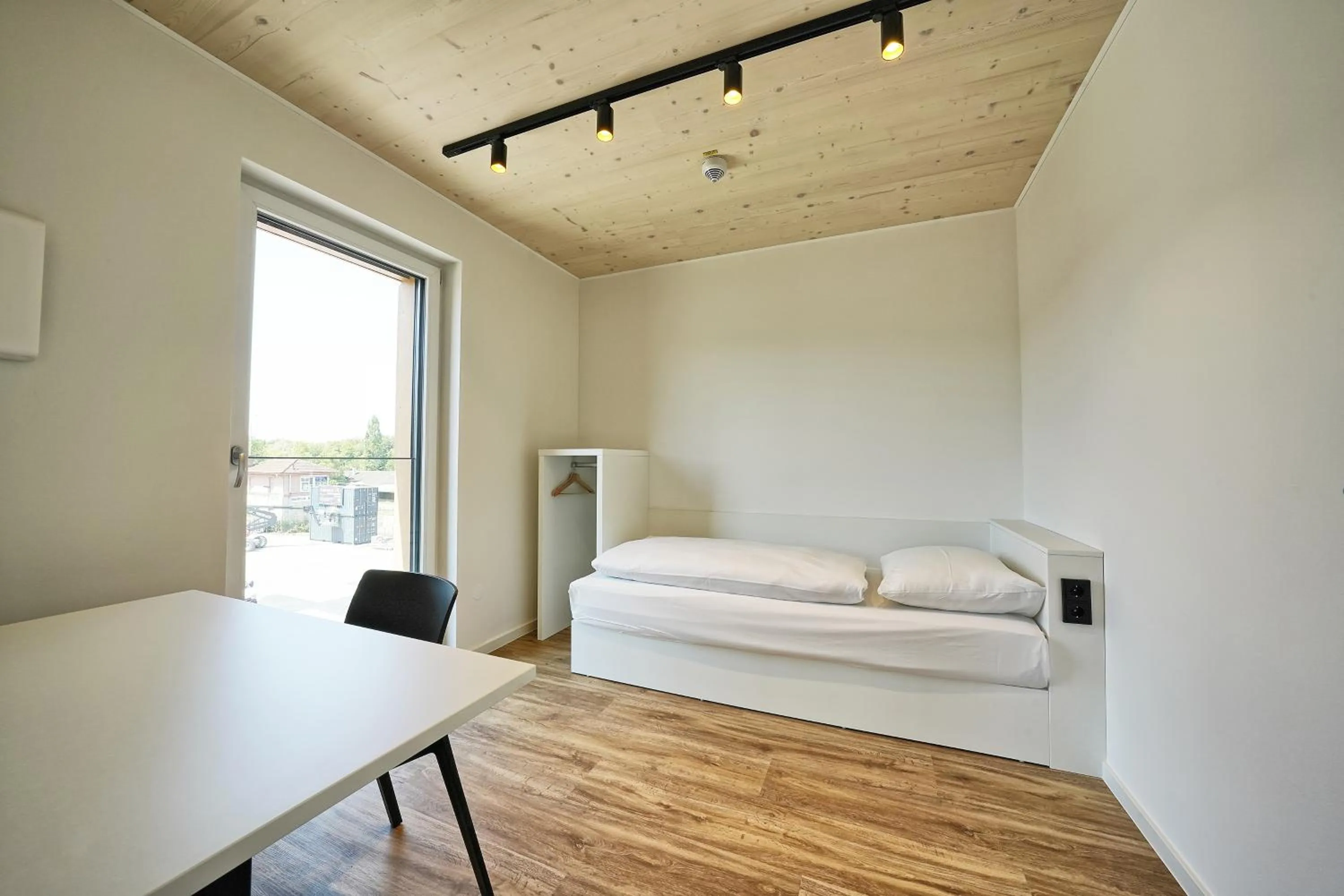 Bedroom, Bed in Timber One Boardinghouse Dorfen