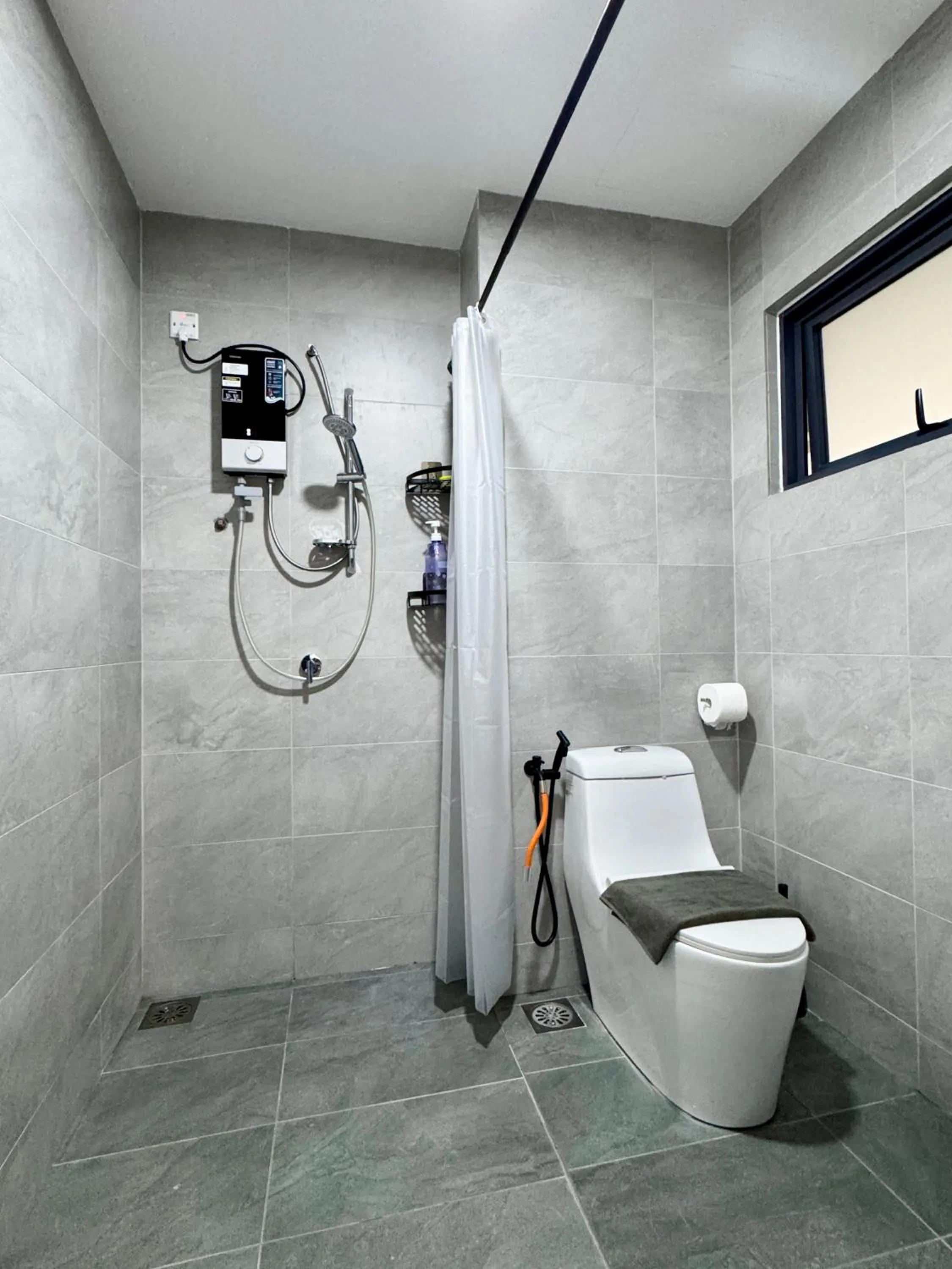 Shower in Sunsuria Forum SOHO & Residence Suites Setia Alam by MOKA