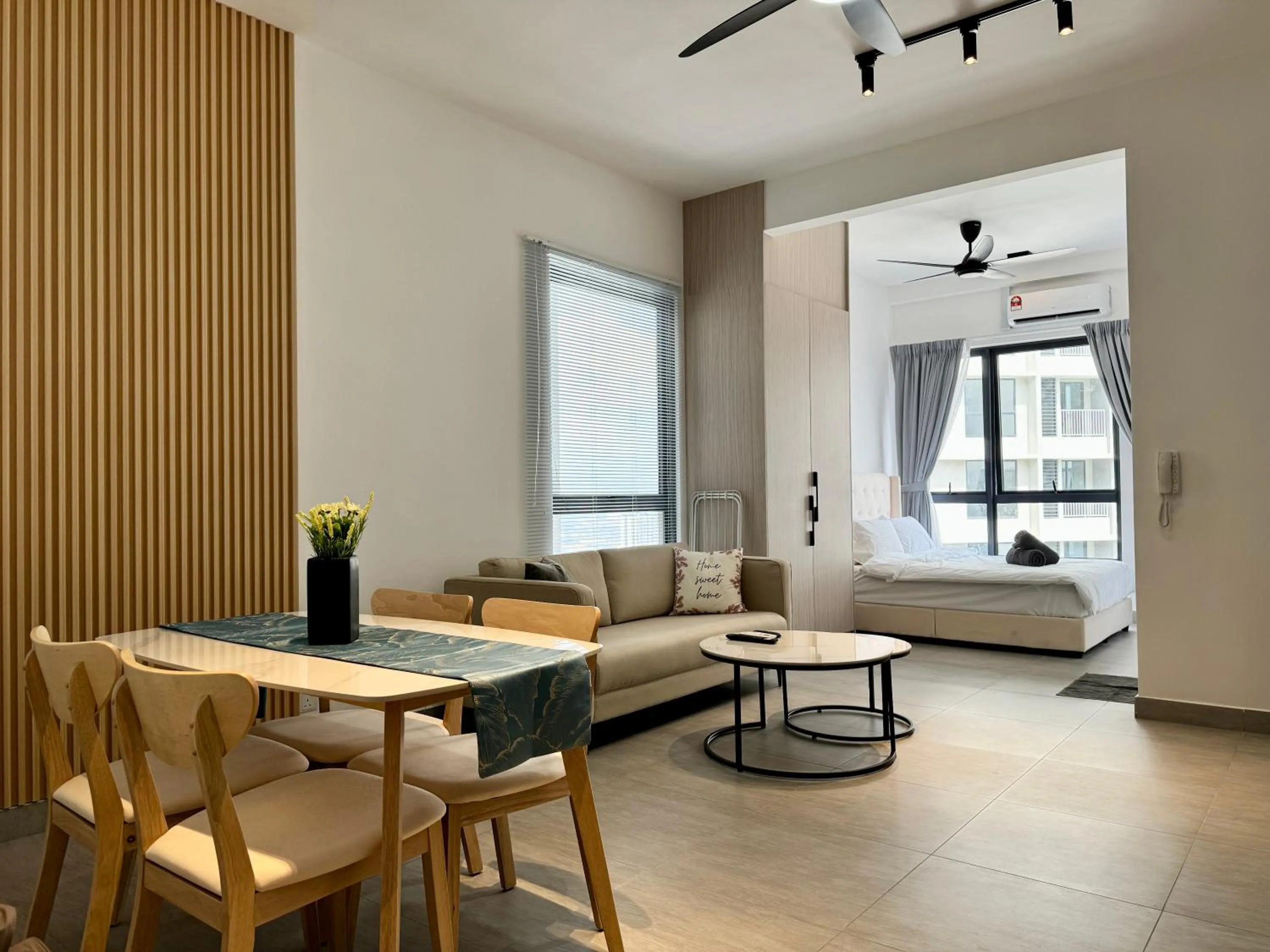 Living room in Sunsuria Forum SOHO & Residence Suites Setia Alam by MOKA