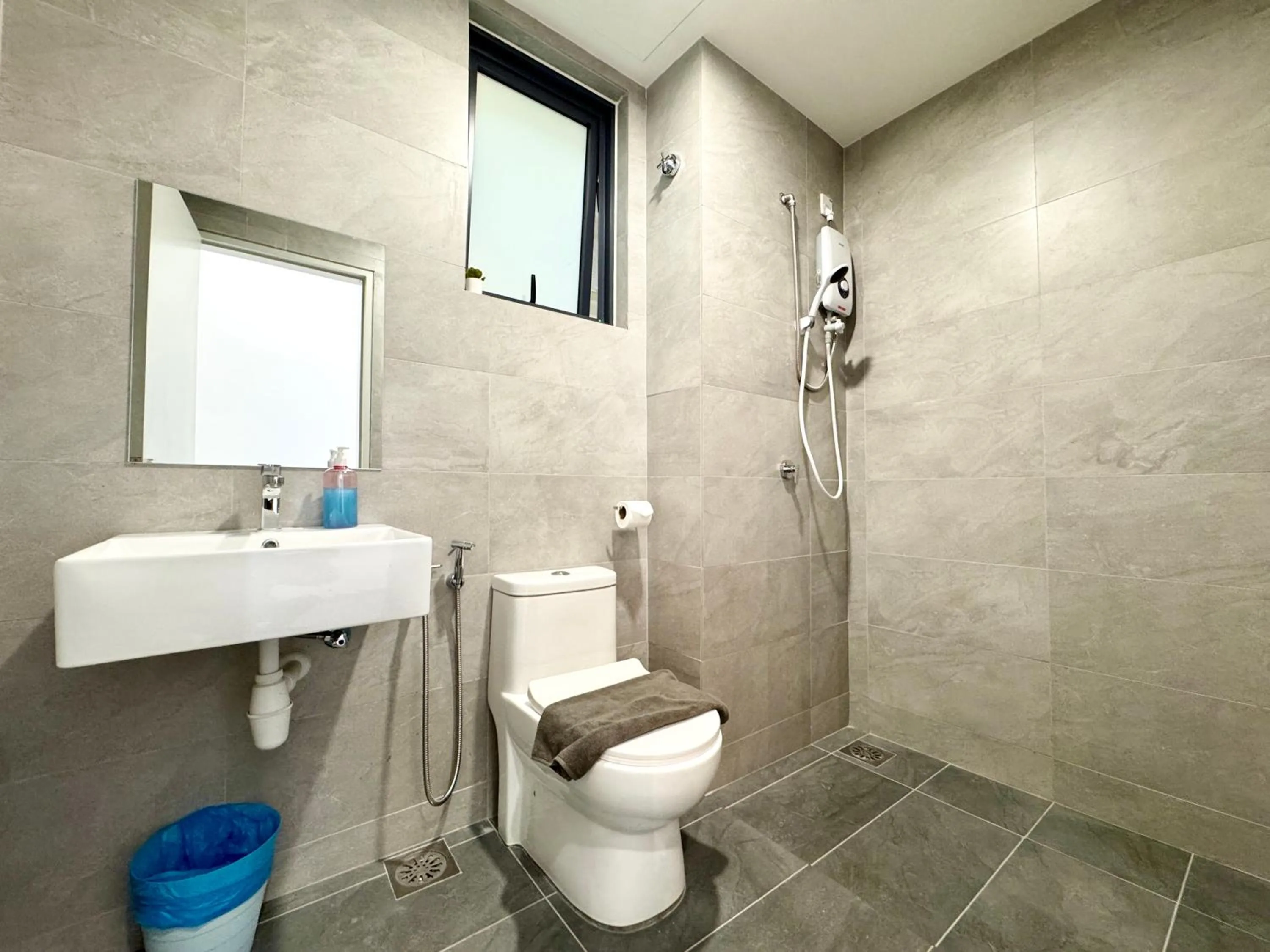 Toilet in Sunsuria Forum SOHO & Residence Suites Setia Alam by MOKA